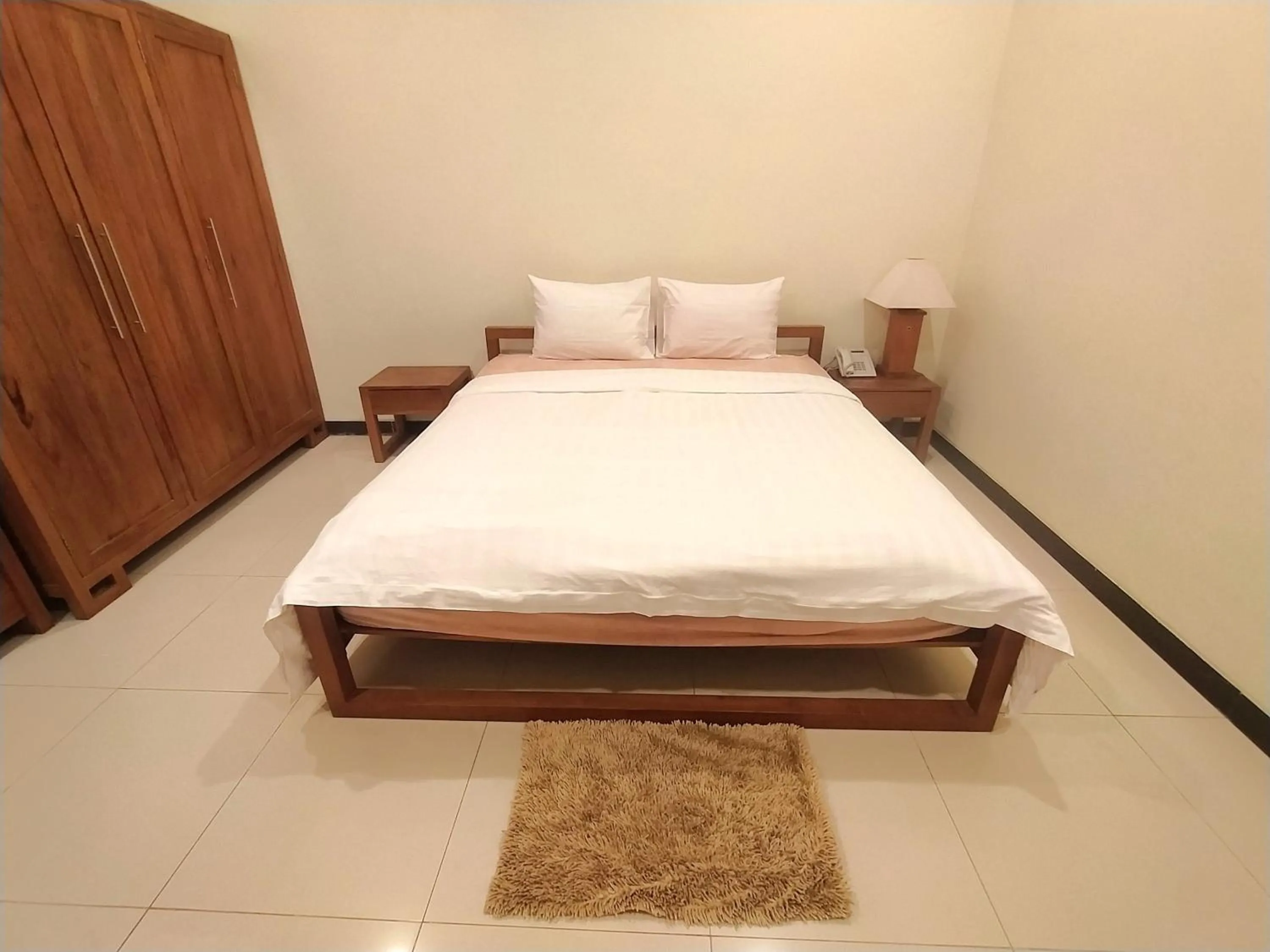 Bed in Alloro Boutique Hotel Pacitan