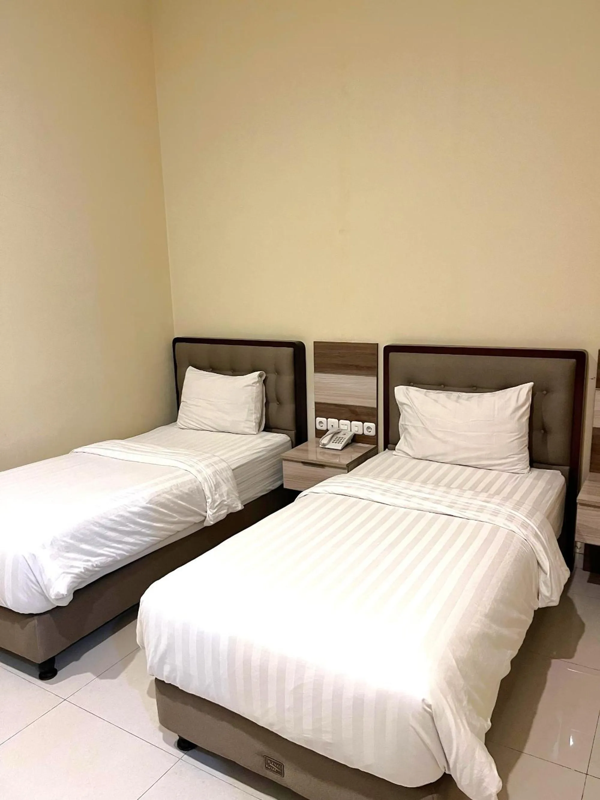 Bed in Alloro Boutique Hotel Pacitan