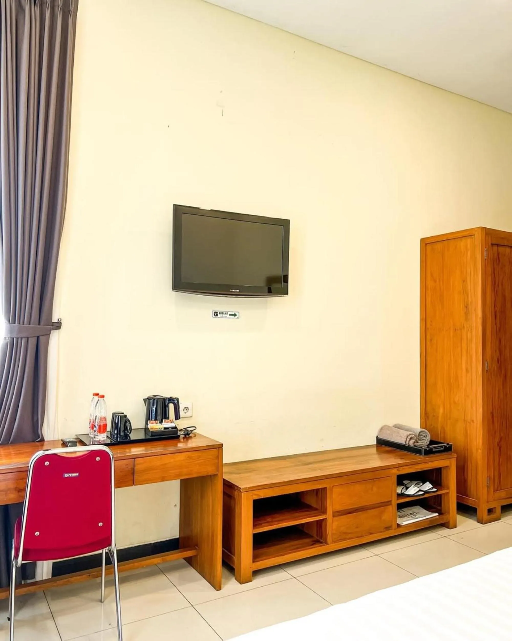 TV and multimedia in Alloro Boutique Hotel Pacitan
