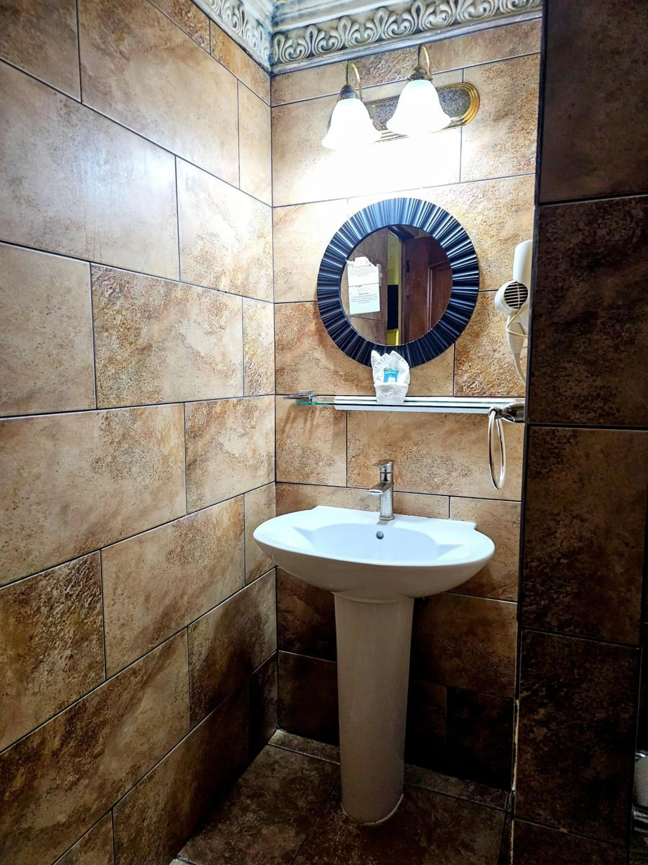 Bathroom in Antigua Inn Hotel