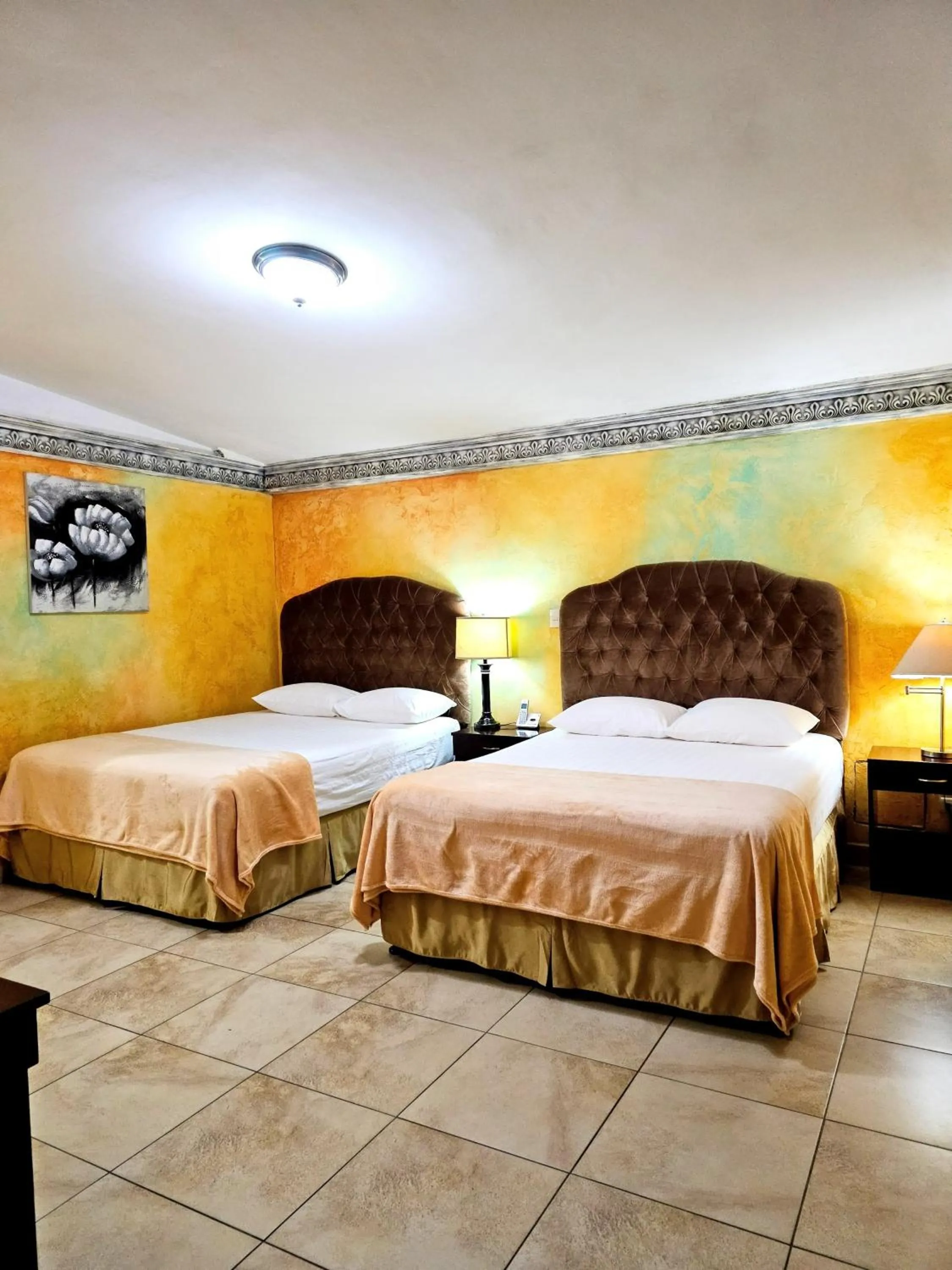 Bed in Antigua Inn Hotel