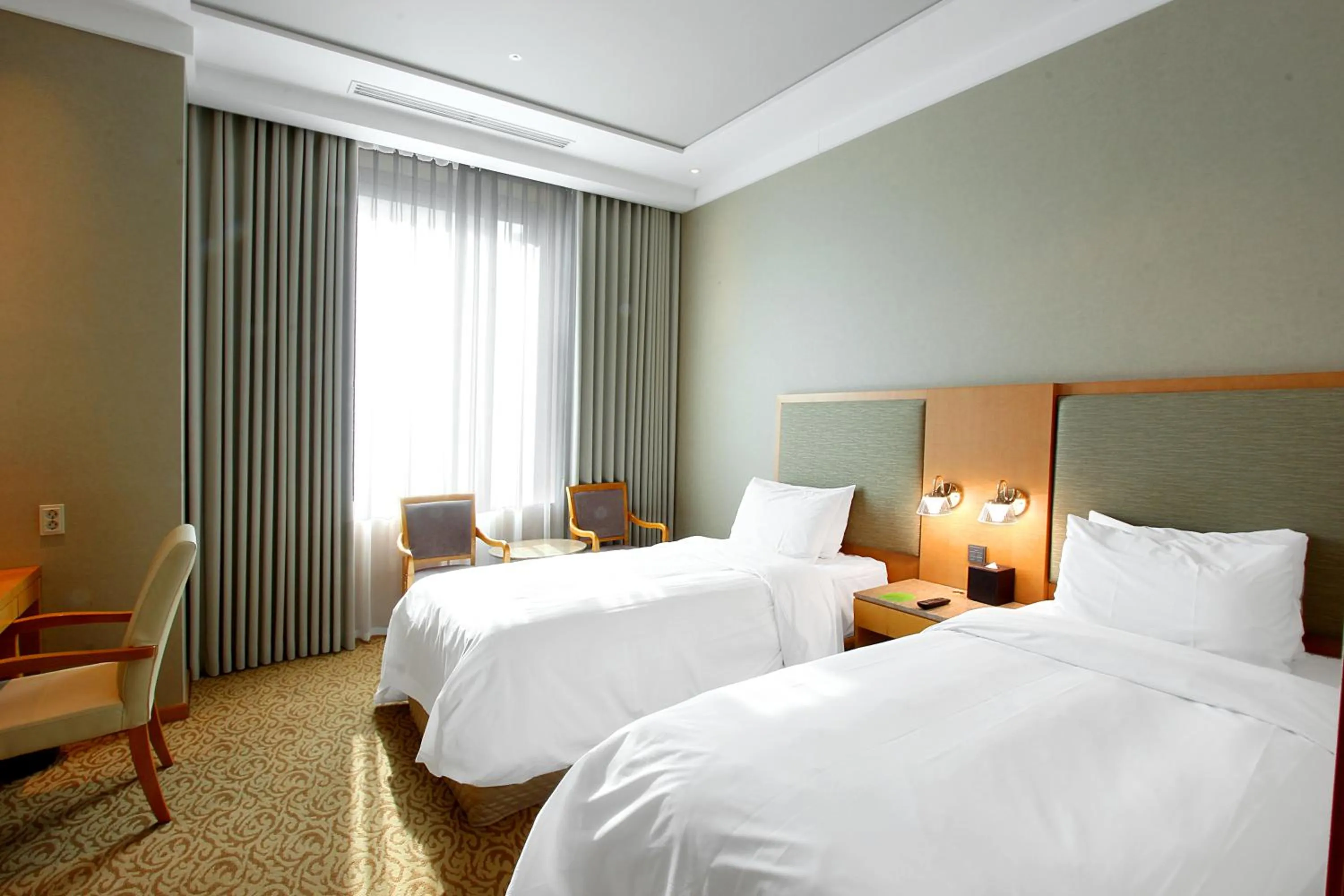 Bed in Daegu Grand Hotel