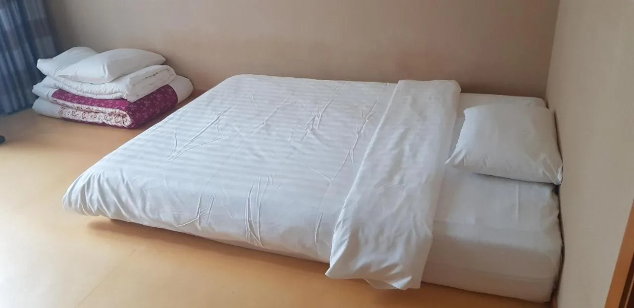 Bed in Daegu Grand Hotel
