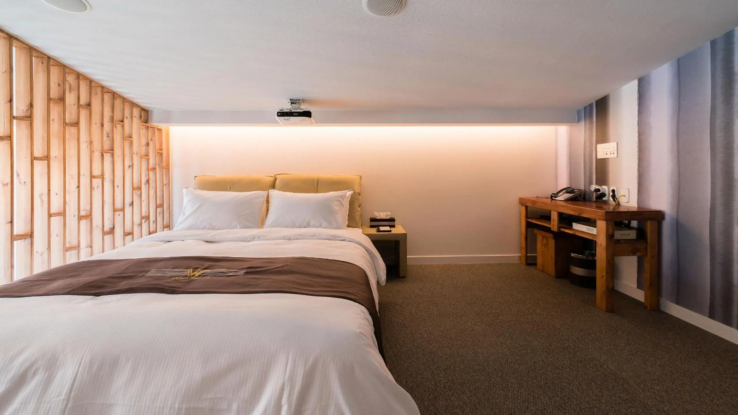 Bed in W Jiwoo Resort