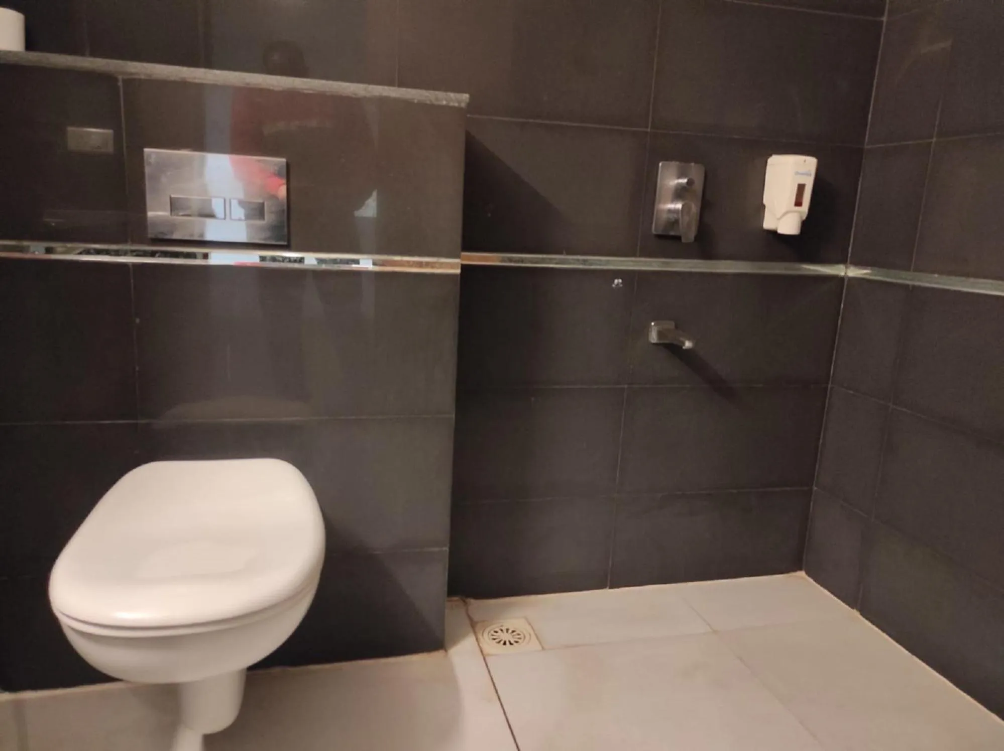 Bathroom in Krishna Inn - Royal Hotels