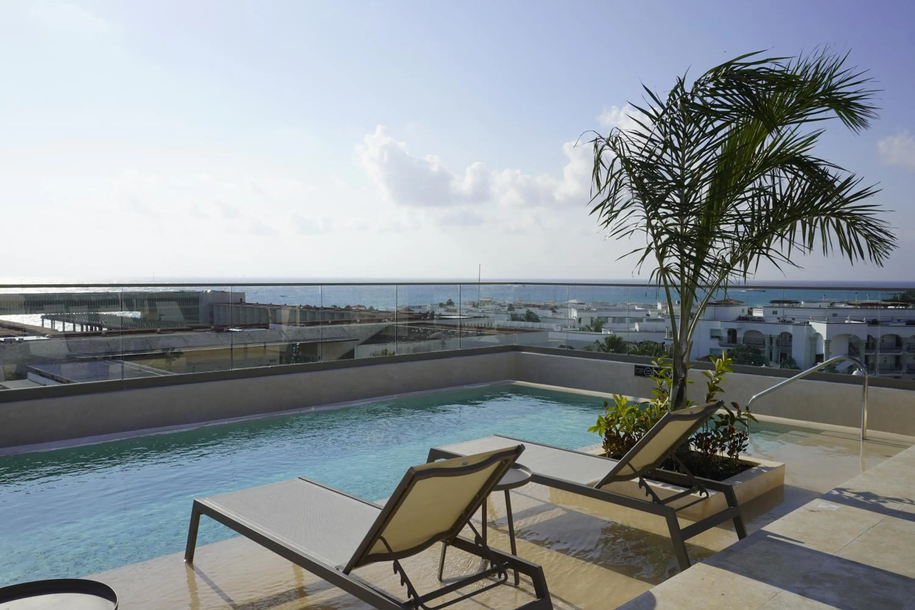 Swimming pool in Hotel Indigo Playa del Carmen by IHG