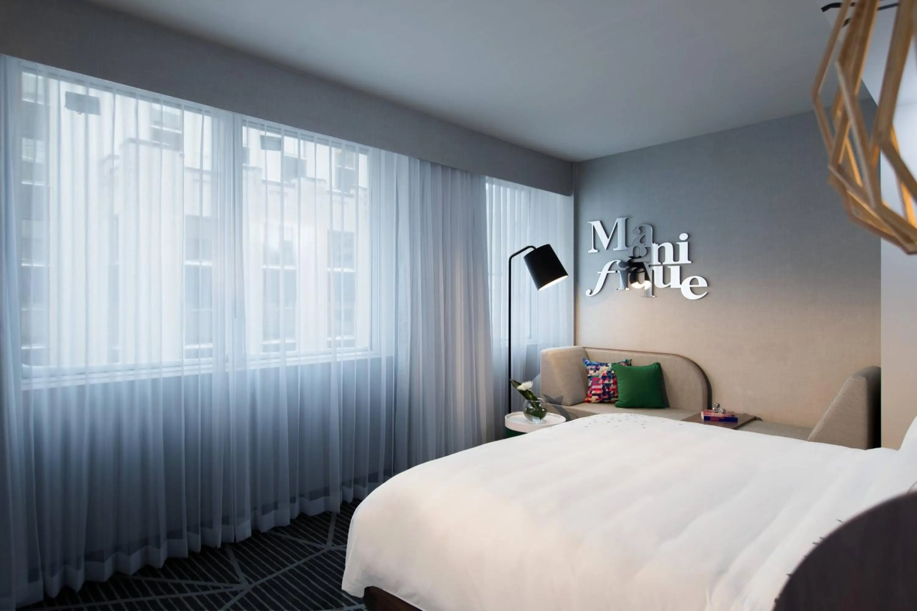 Photo of the whole room, Bed in Renaissance Montreal Downtown Hotel