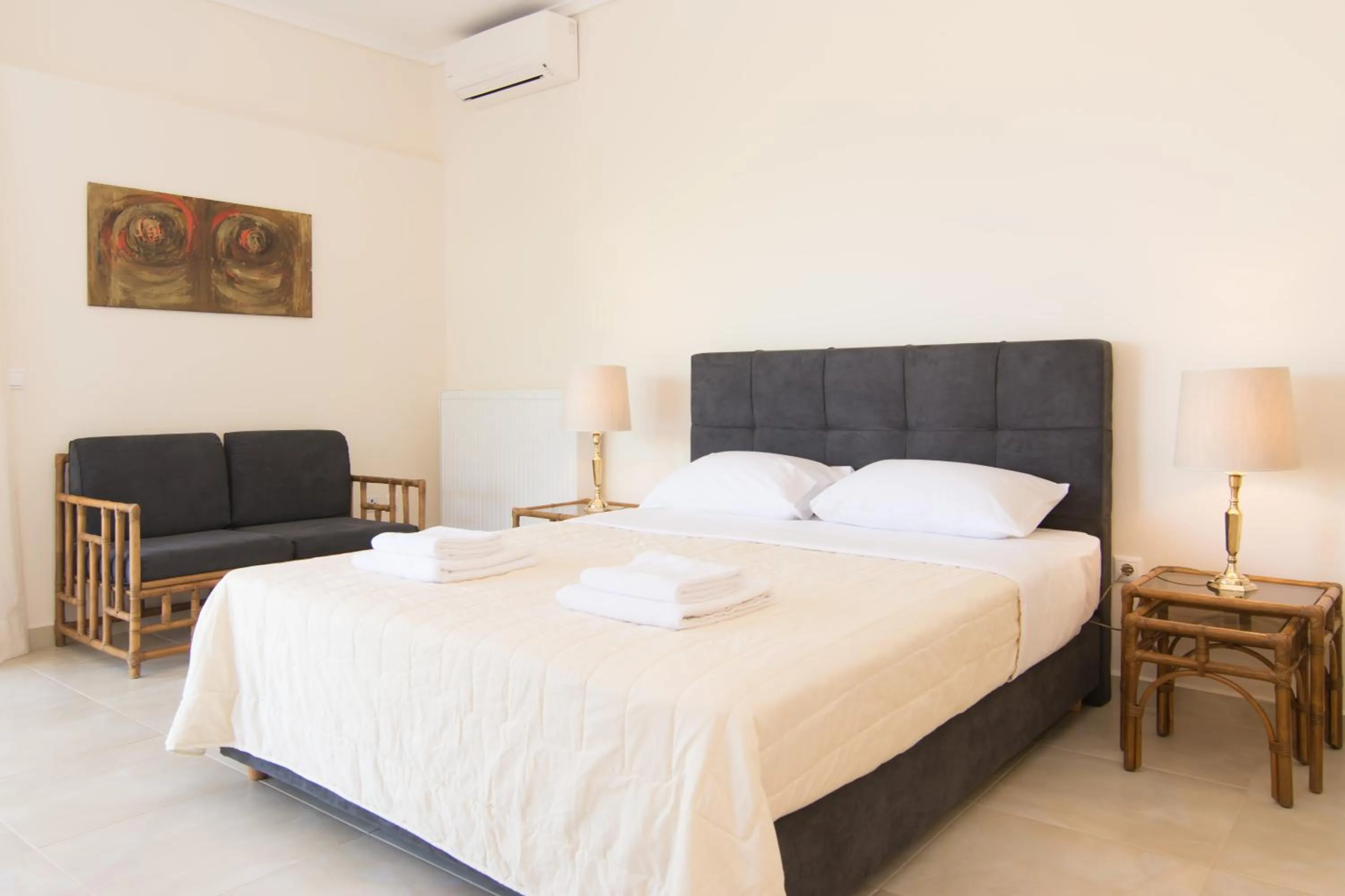 Seating area, Bed in Angelbay Bungalows