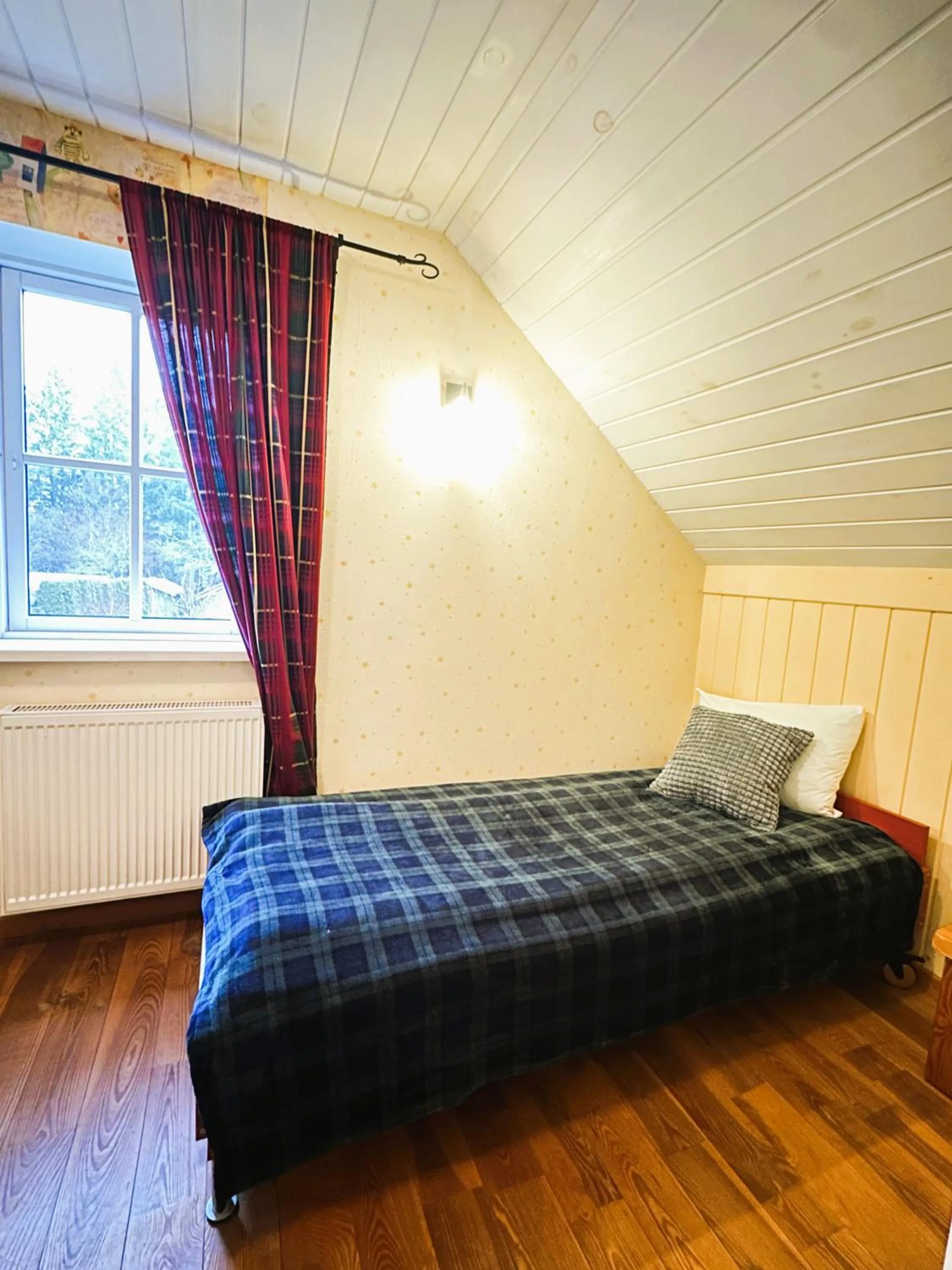 Bedroom in North Lakeside Villa Plateliai