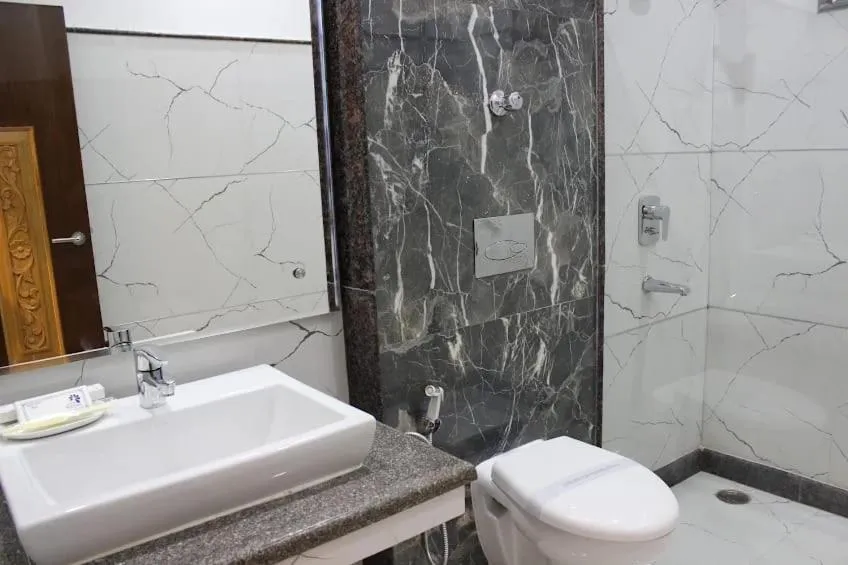 Toilet in Hotel Mayur by RoomsInc Katra