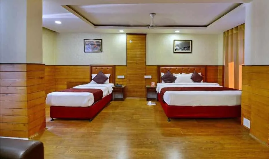 Photo of the whole room, Bed in Hotel Mayur by RoomsInc Katra