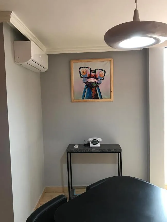 Communal lounge/ TV room in Etablissement moderne