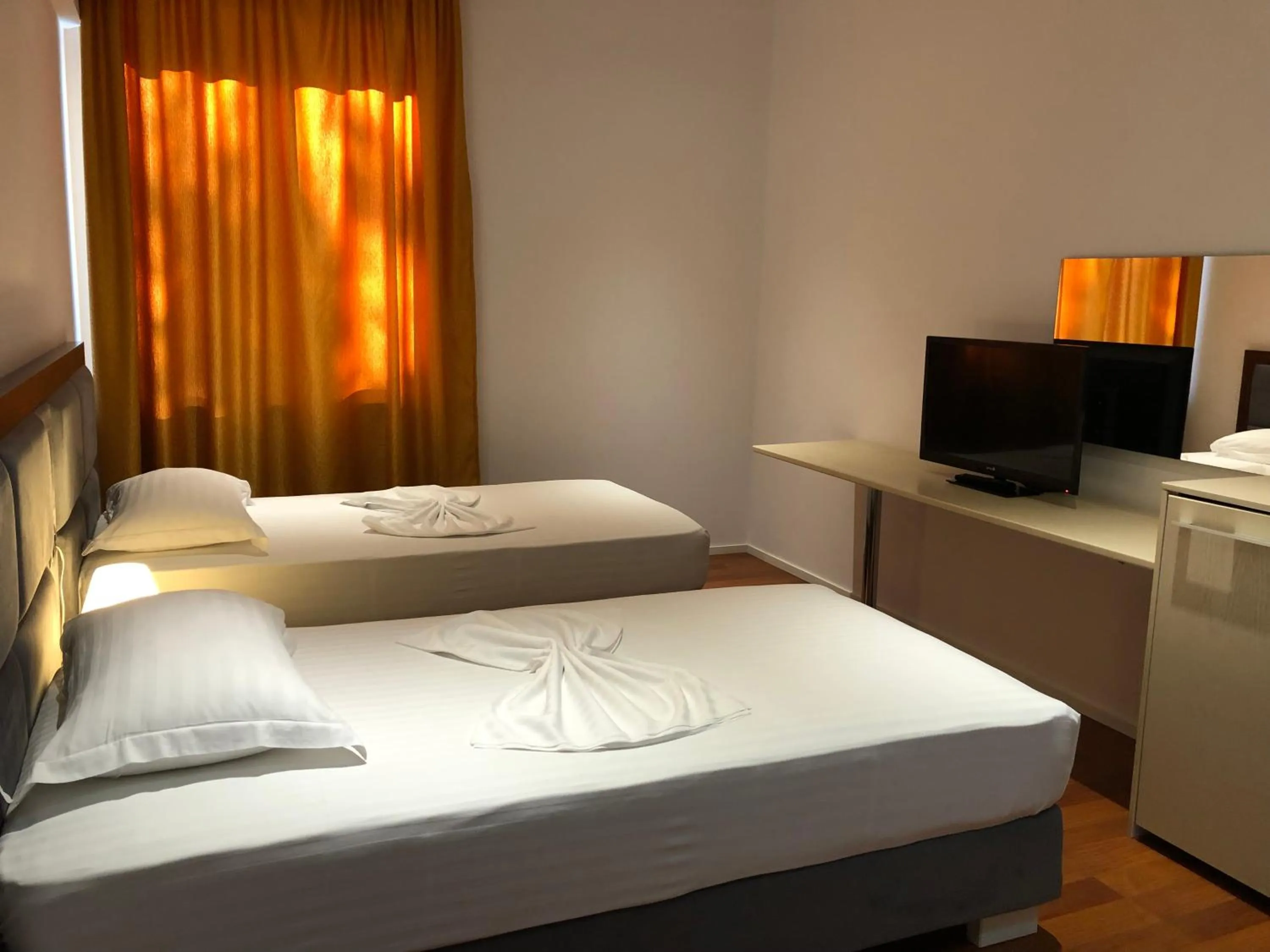 Bed in Nemesis Hotel