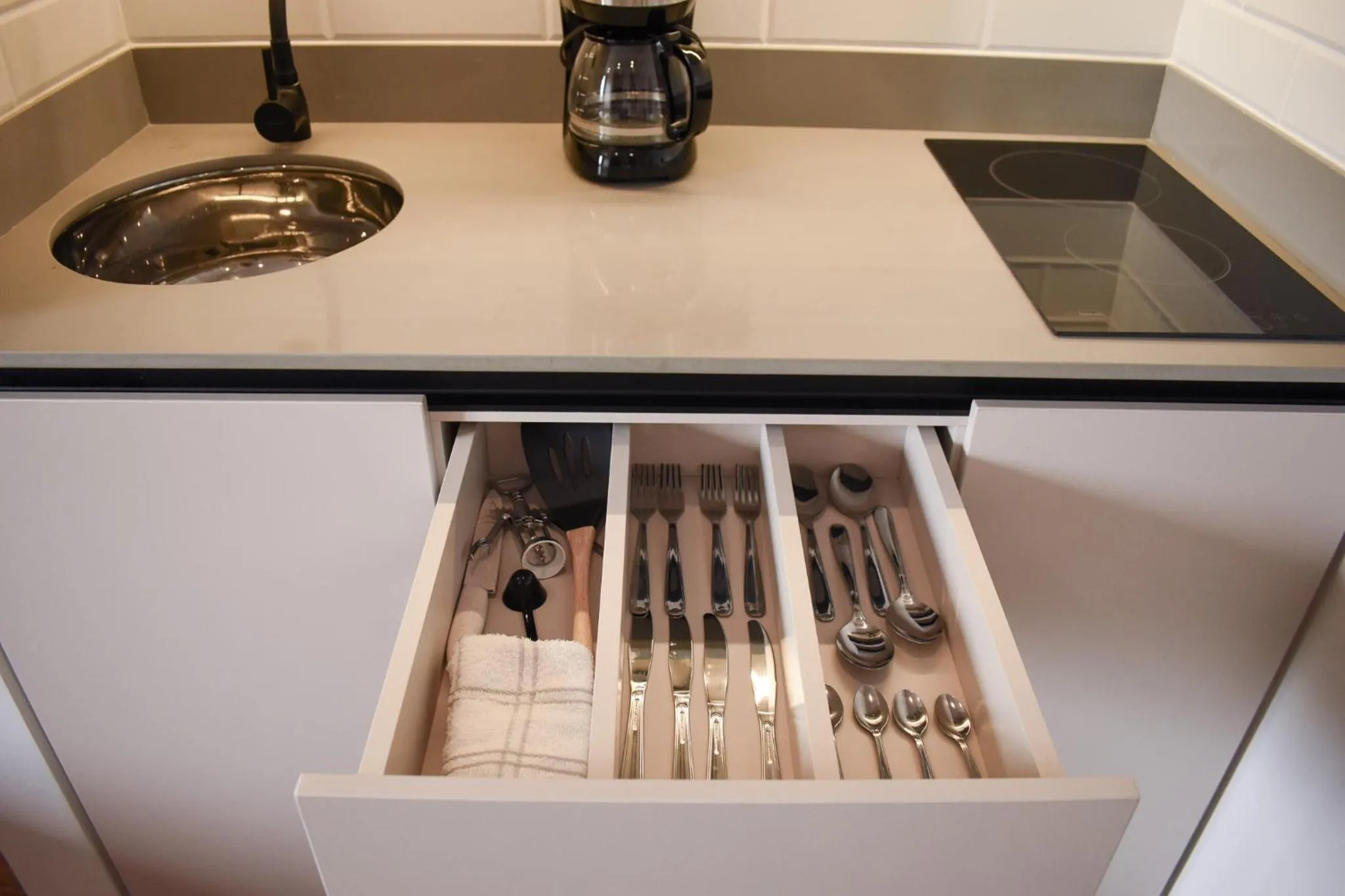 Kitchen or kitchenette in Hotel Ryo 74B Suites by Growing Group