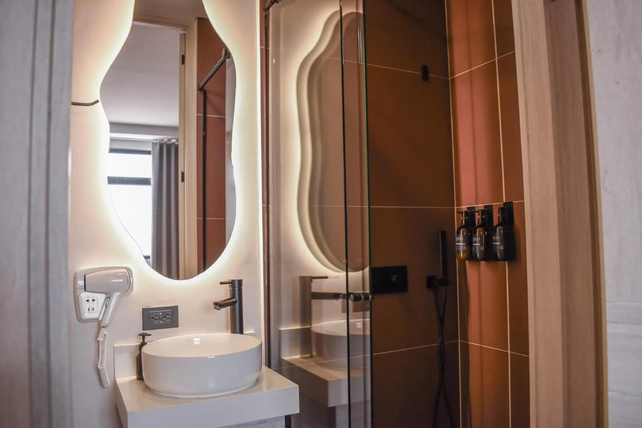 Bathroom in Hotel Ryo 74B Suites by Growing Group