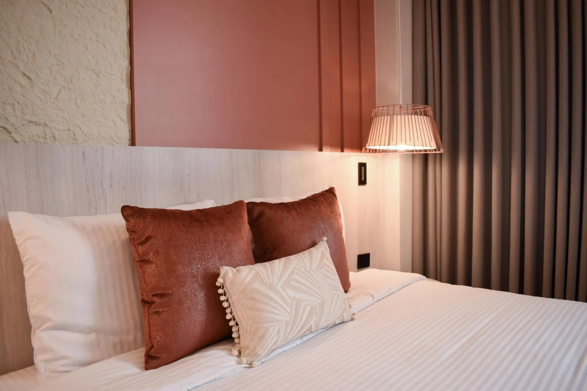 Bed in Hotel Ryo 74B Suites by Growing Group