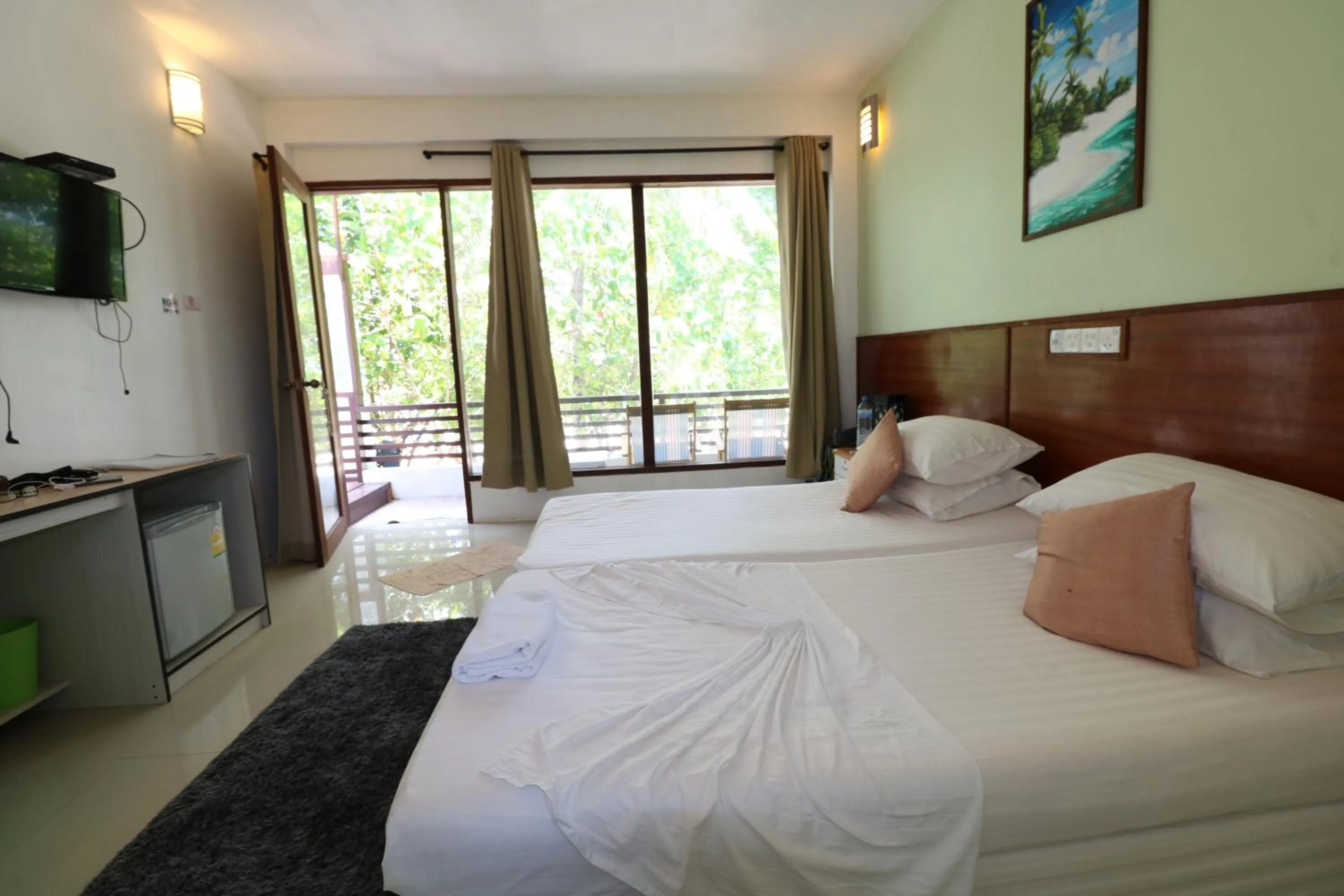 Photo of the whole room, Bed in Liberty Guesthouse Maldives