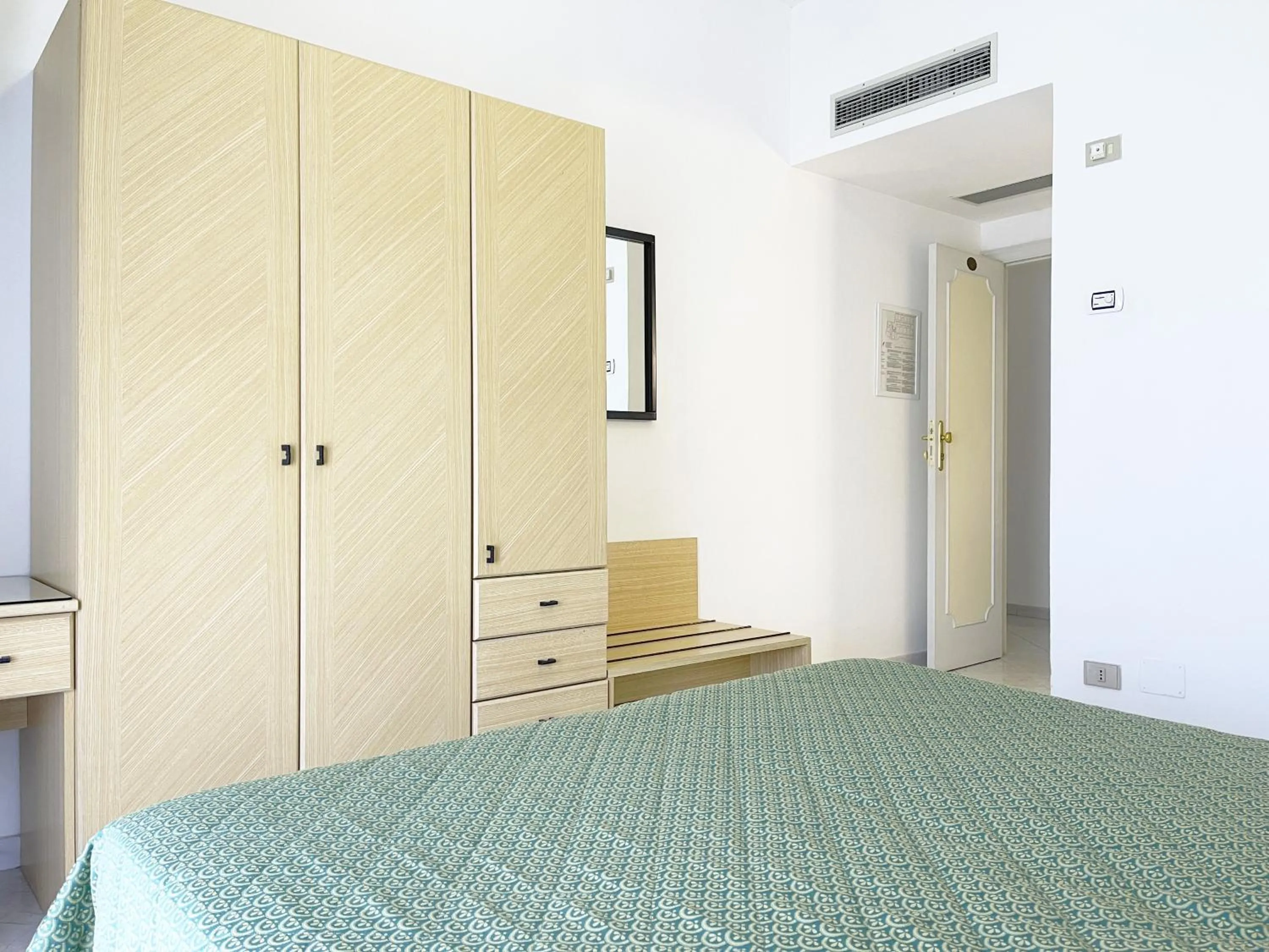 Bedroom in Hotel Reginella