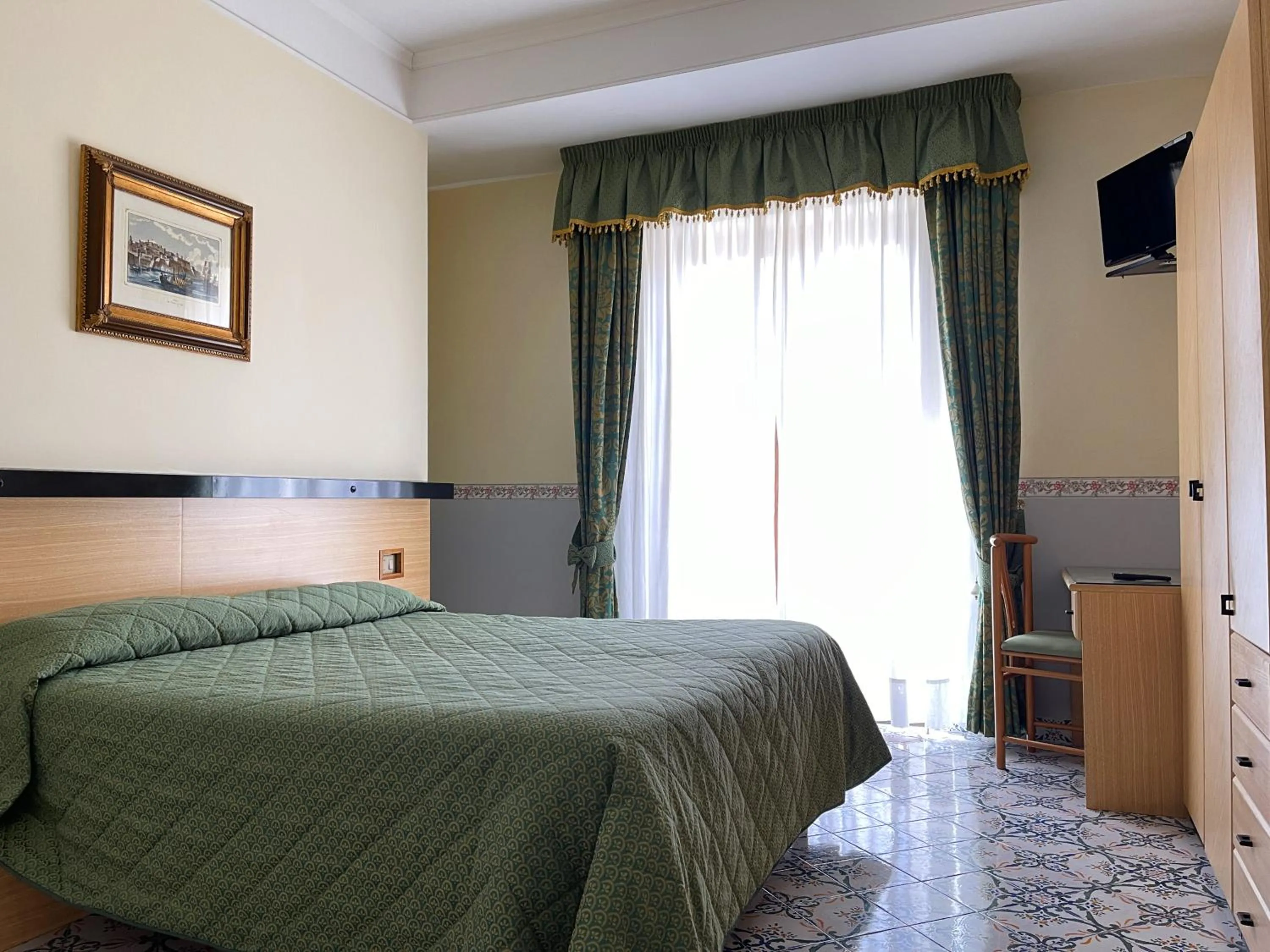 Bedroom in Hotel Reginella