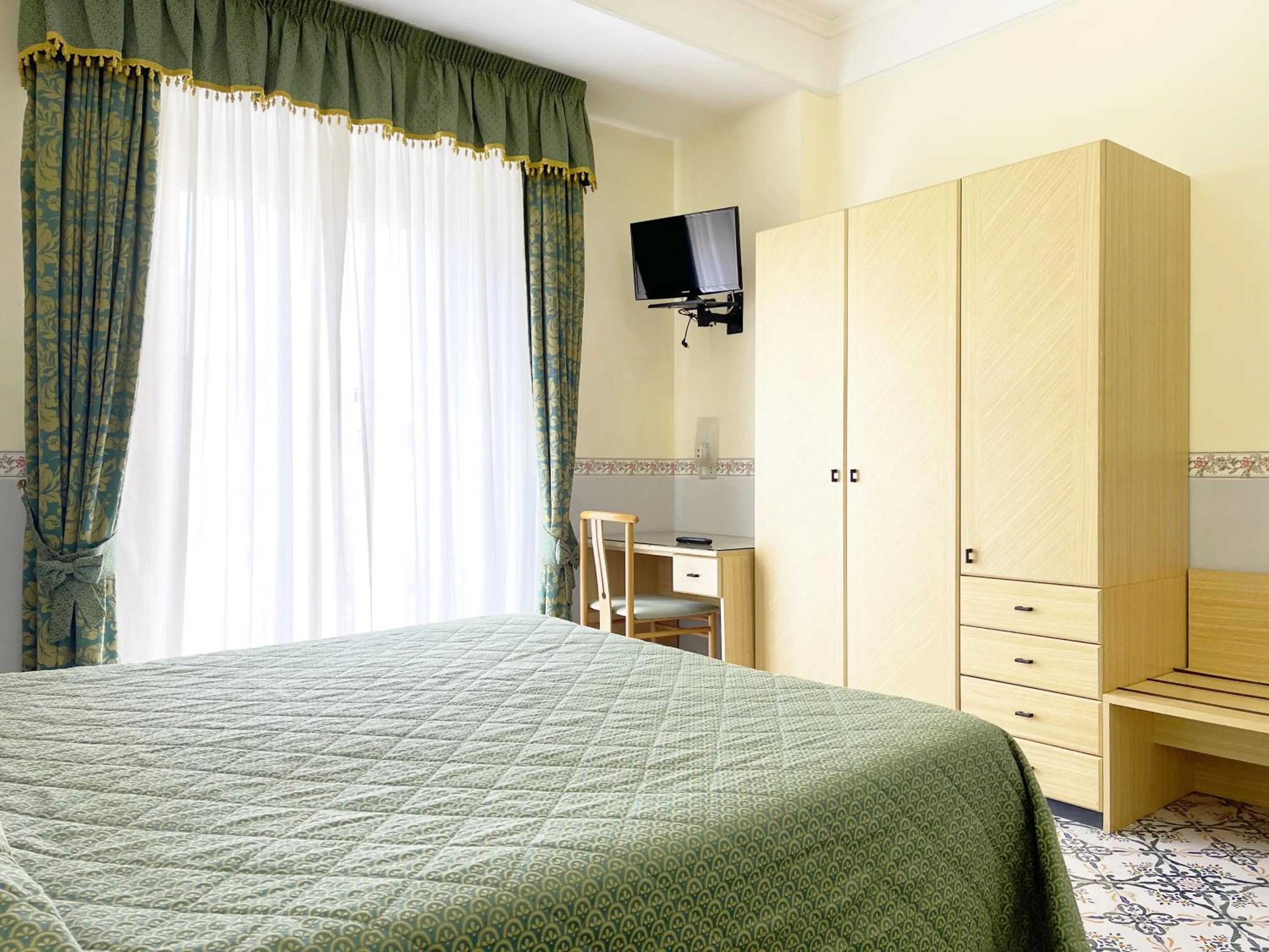 Bedroom in Hotel Reginella