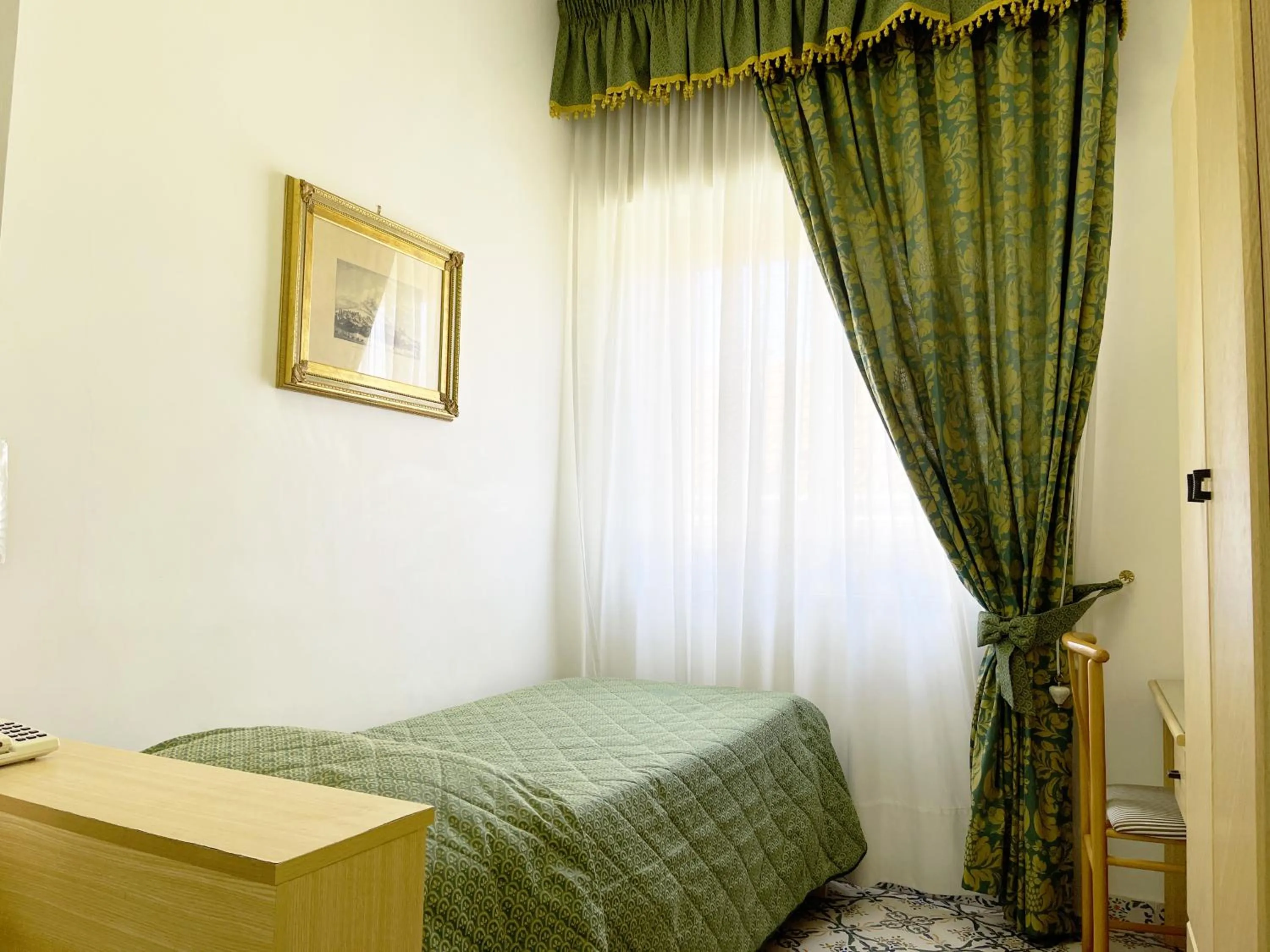 Bed in Hotel Reginella