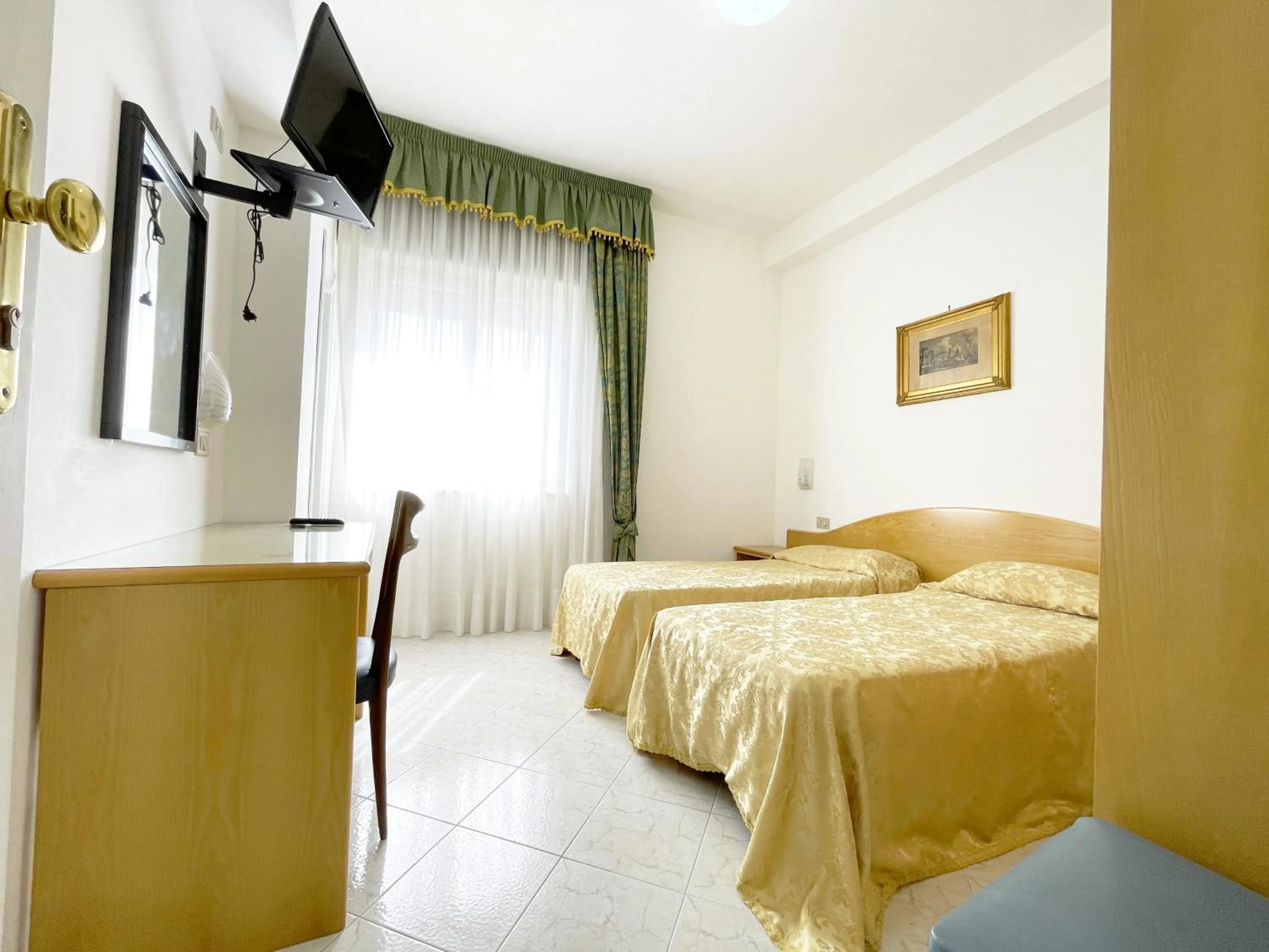 Bed in Hotel Reginella