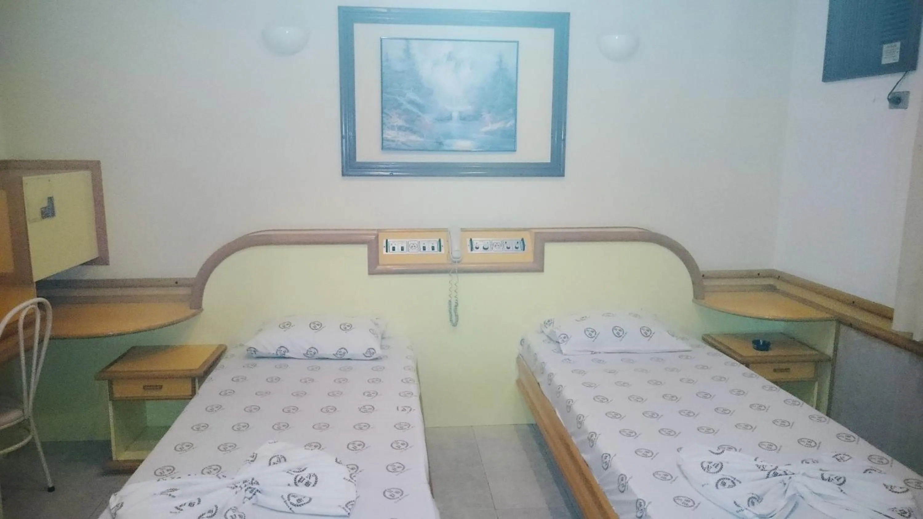 Bed in North Palace Hotel