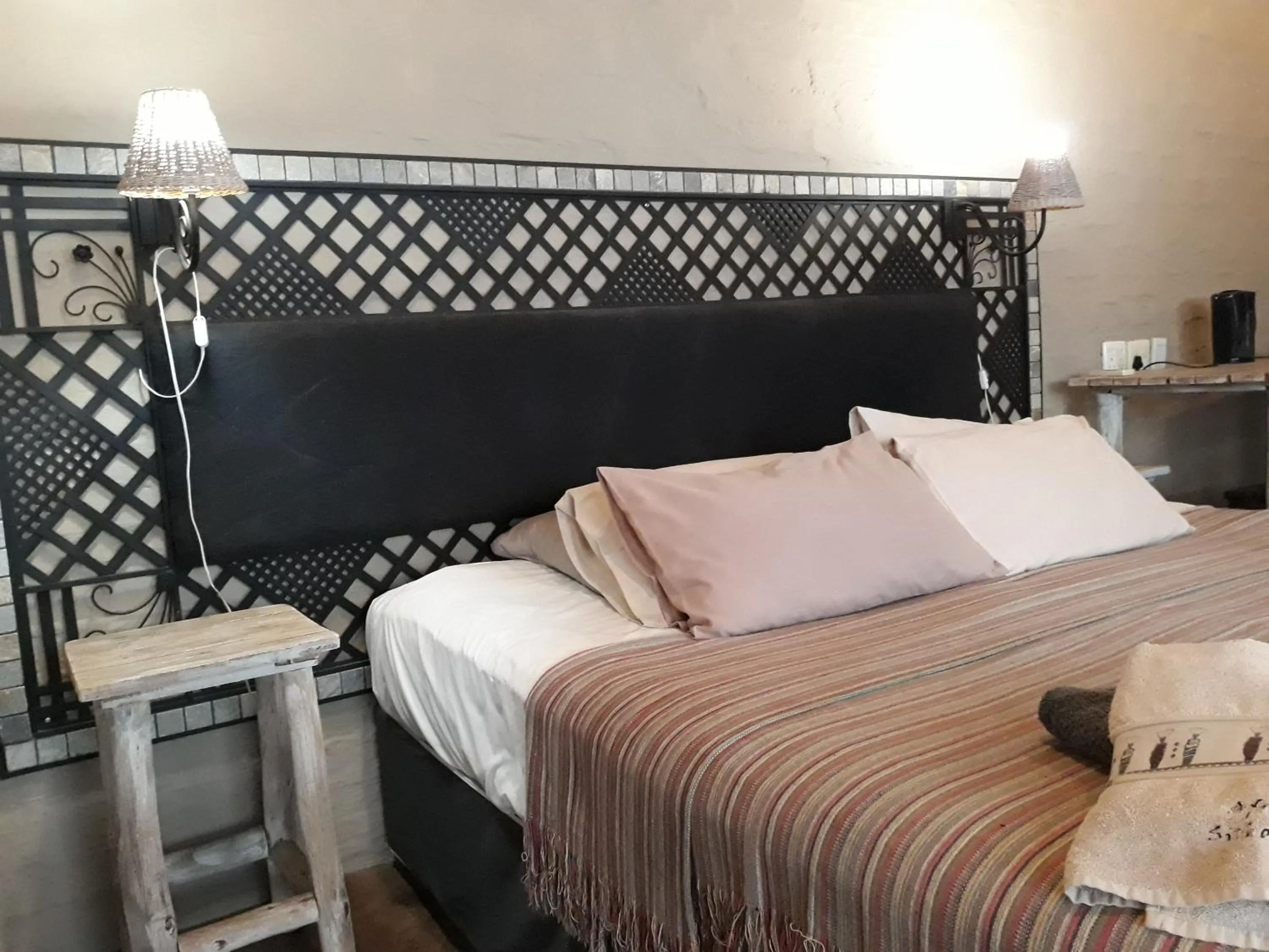 Bed in African Silhouette Guesthouse