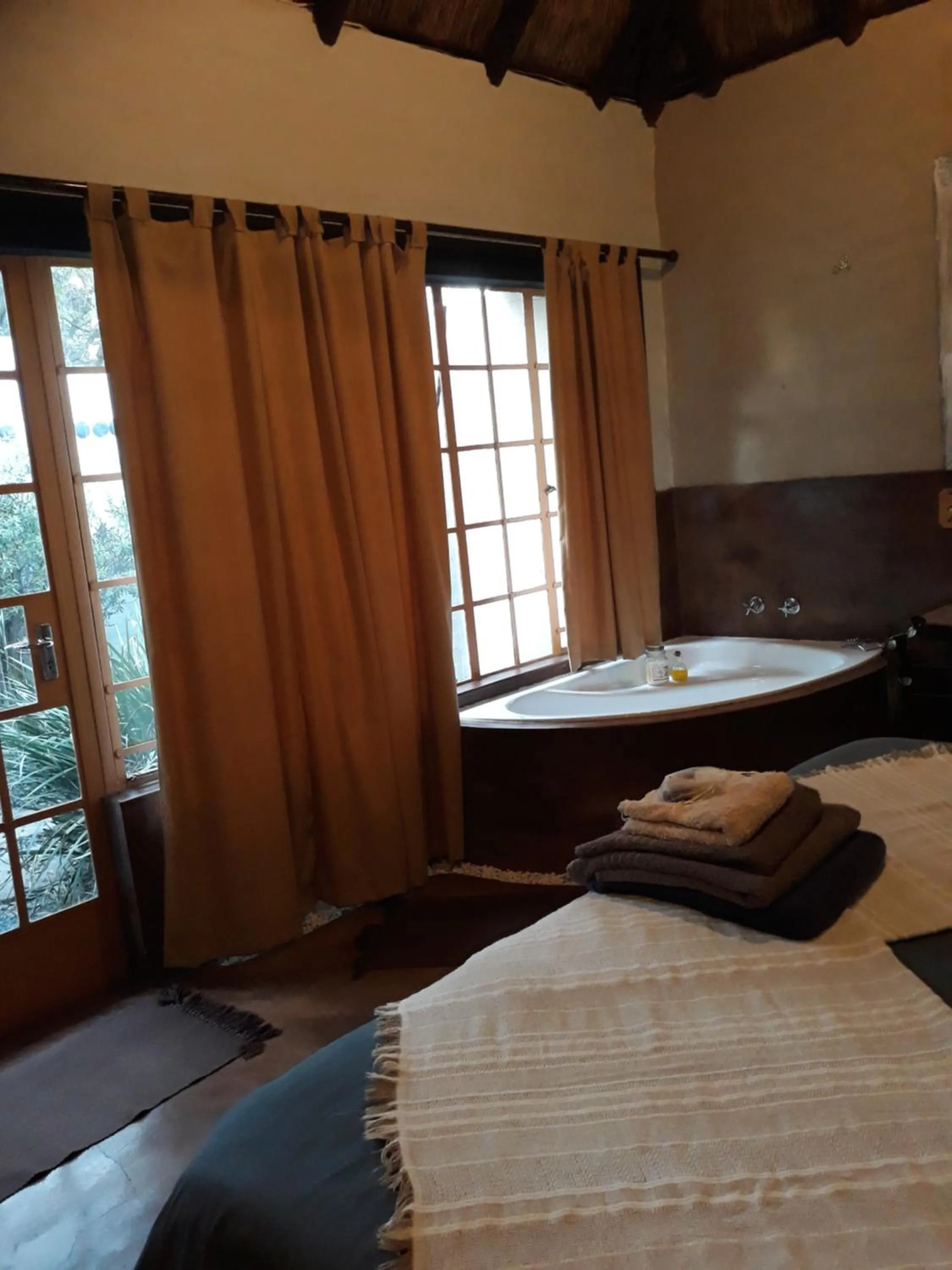 Bed in African Silhouette Guesthouse