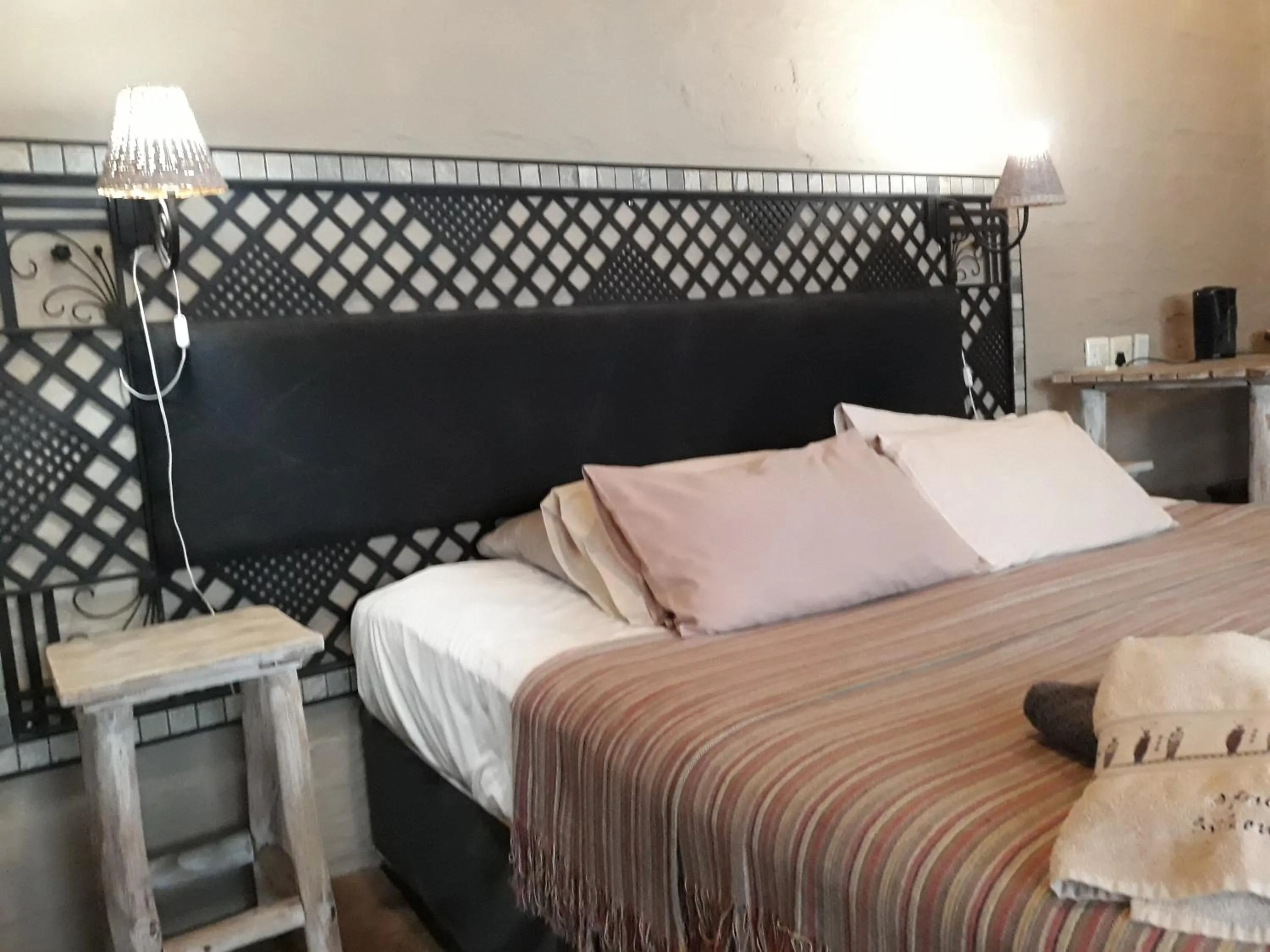 Bed in African Silhouette Guesthouse