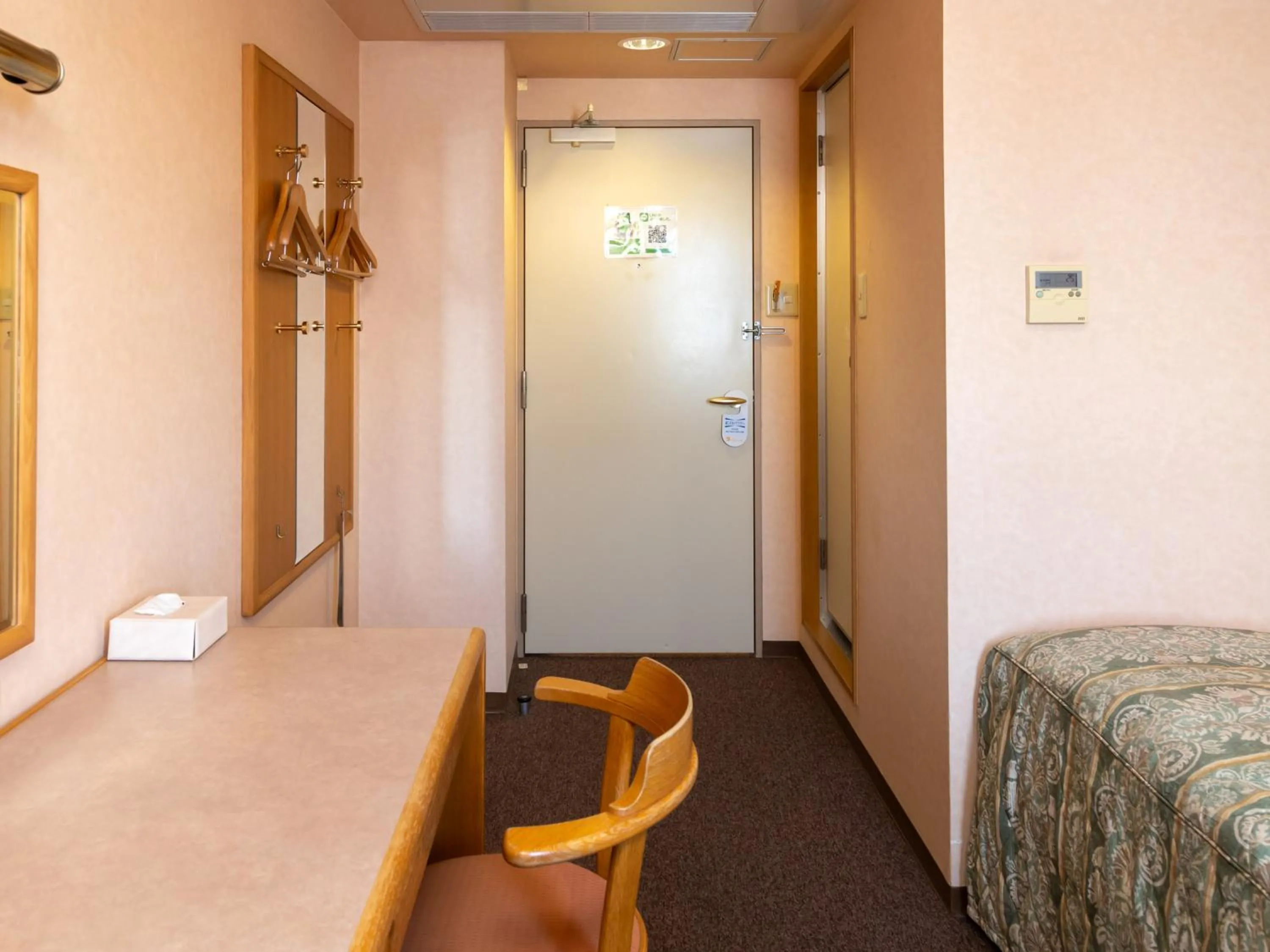 Bed in Tabist Hirosaki Touei Hotel