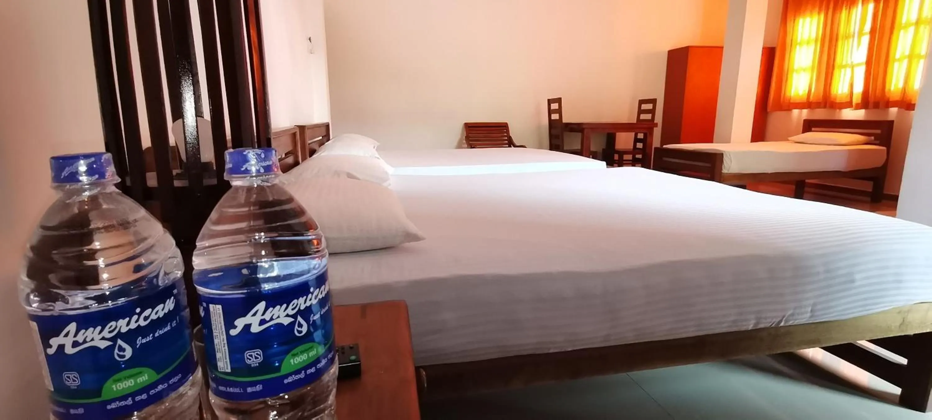Bed in Rajarata Family Resort