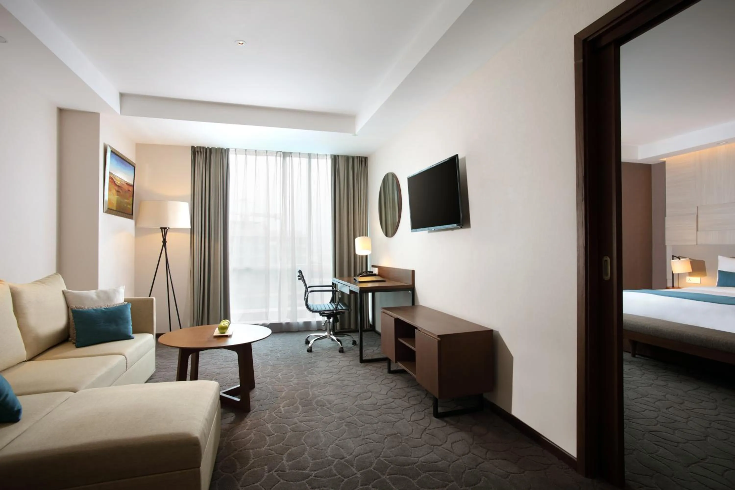 Living room, Bed in Crowne Plaza Bandung by IHG