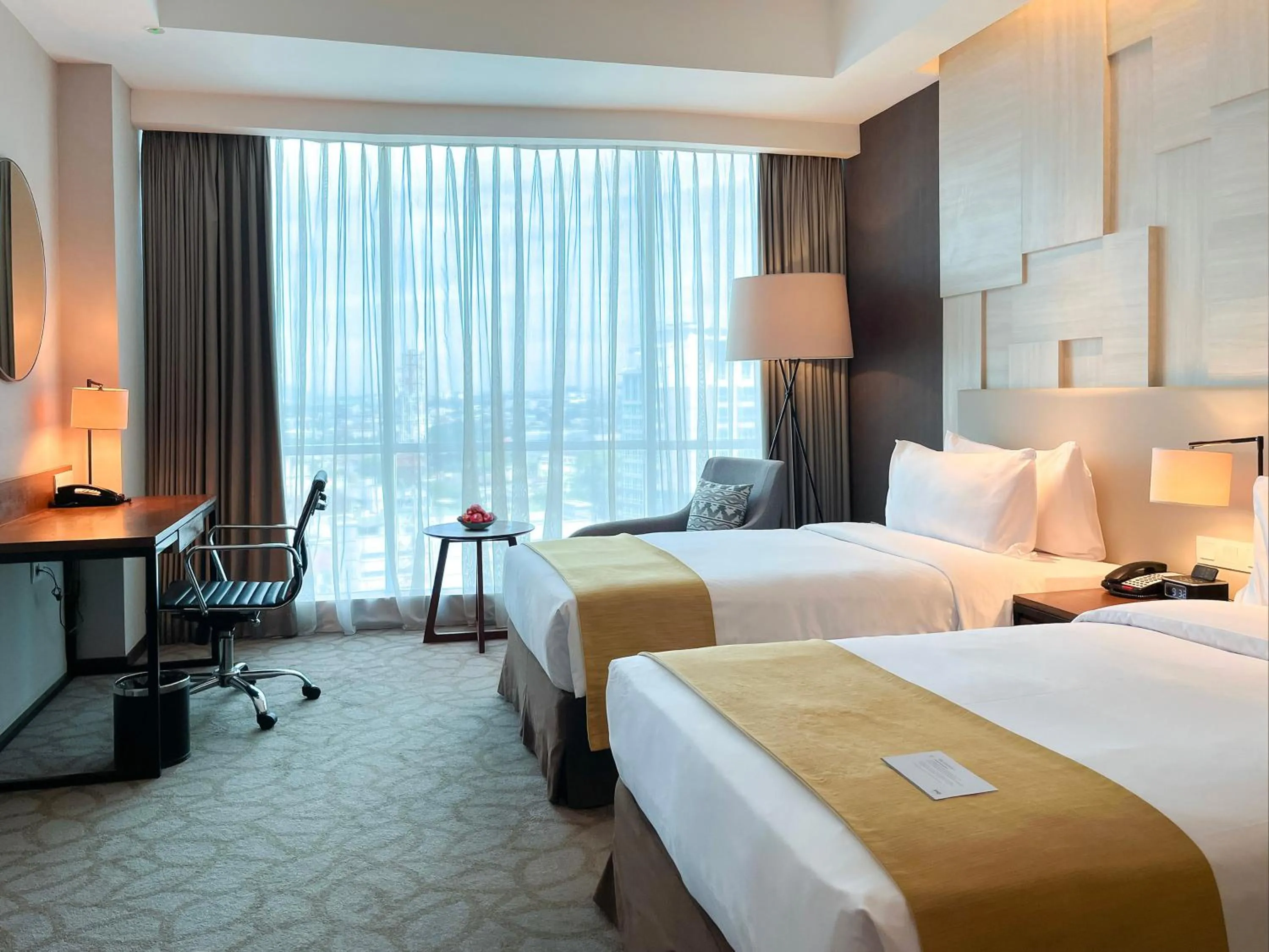 Photo of the whole room, Bed in Crowne Plaza Bandung by IHG