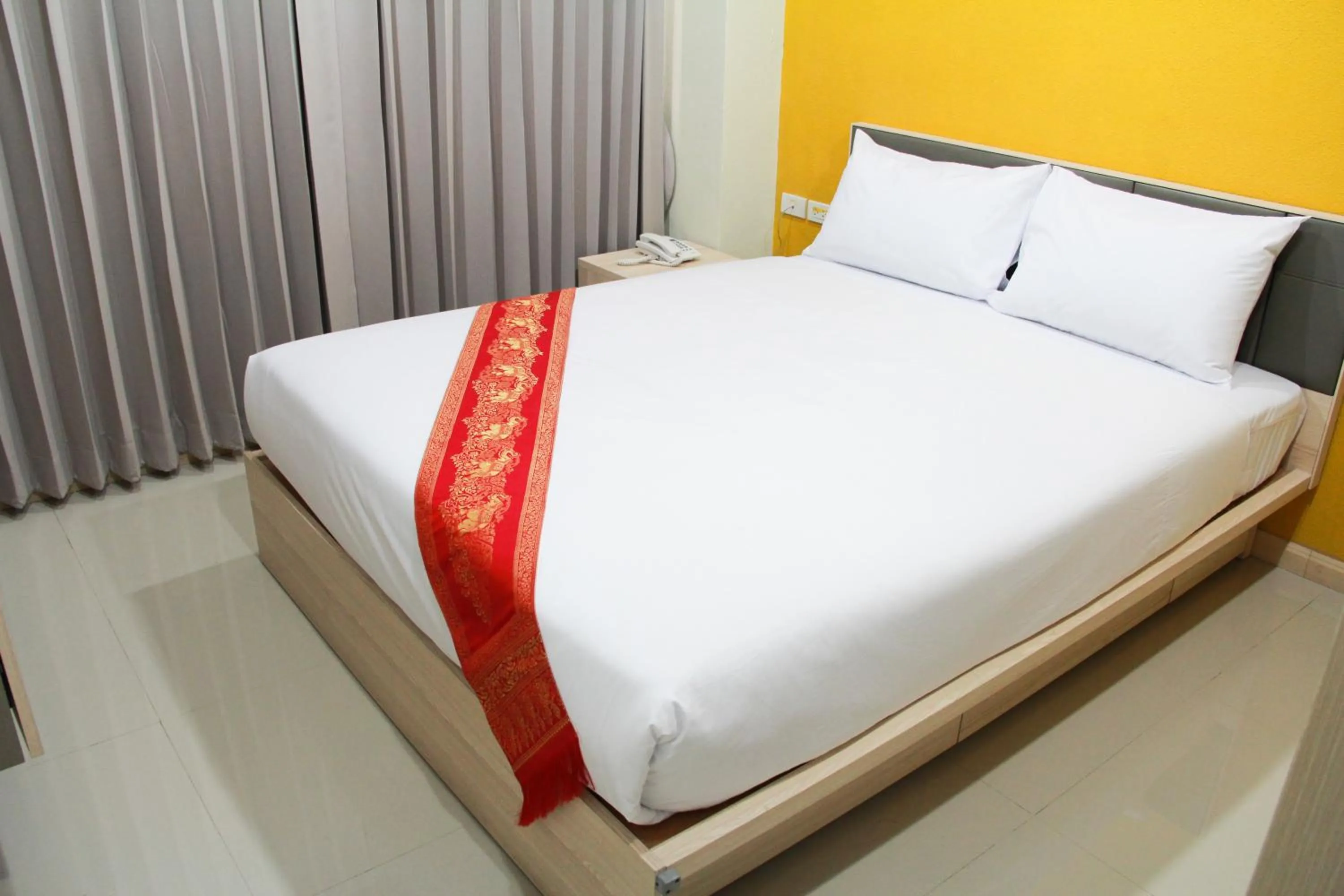 Bed in La Porte Hotel Bangkok