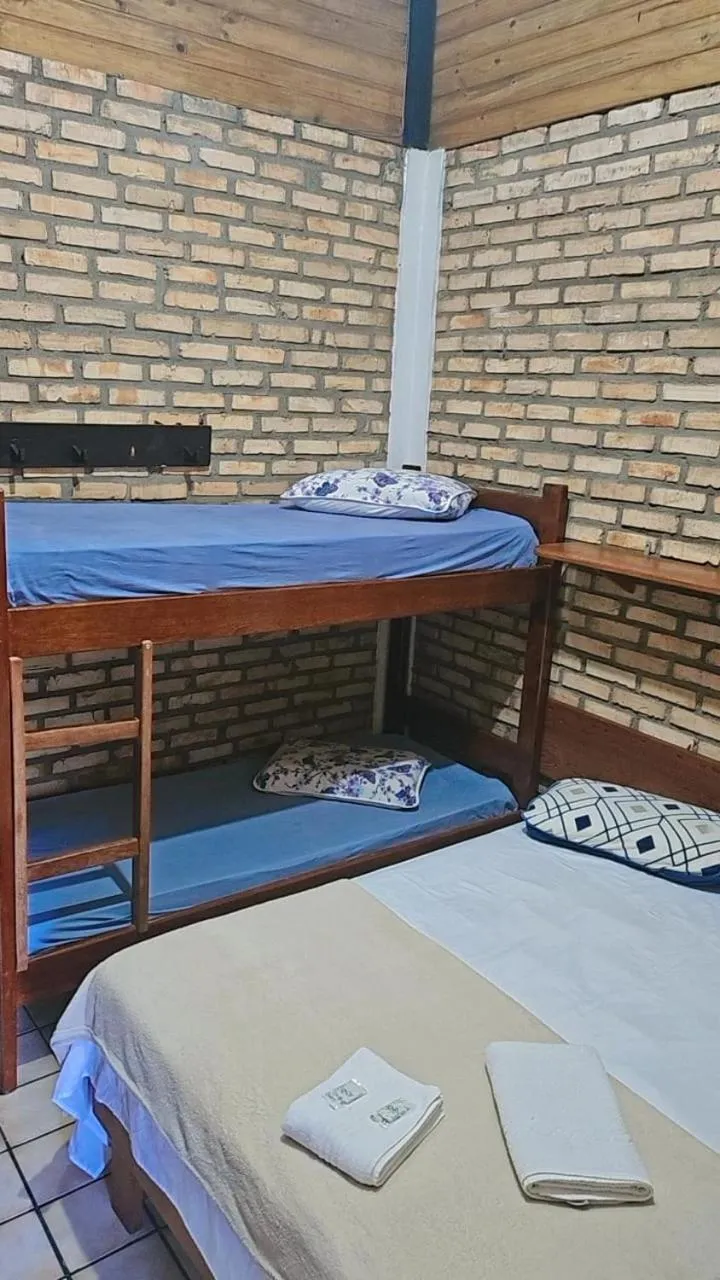 Bed in Pousada Marujo