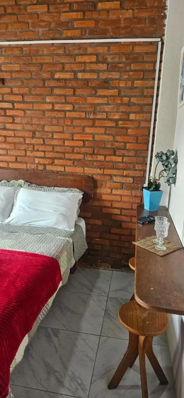 Bed in Pousada Marujo