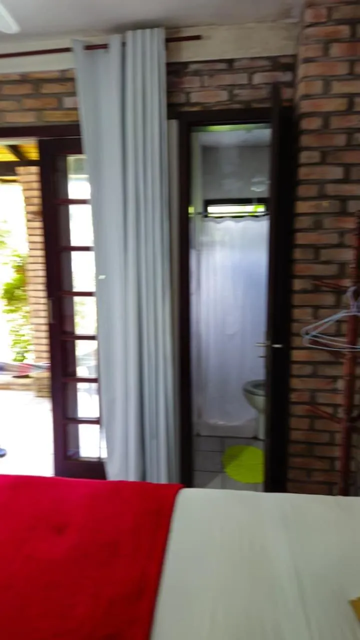 Bed in Pousada Marujo