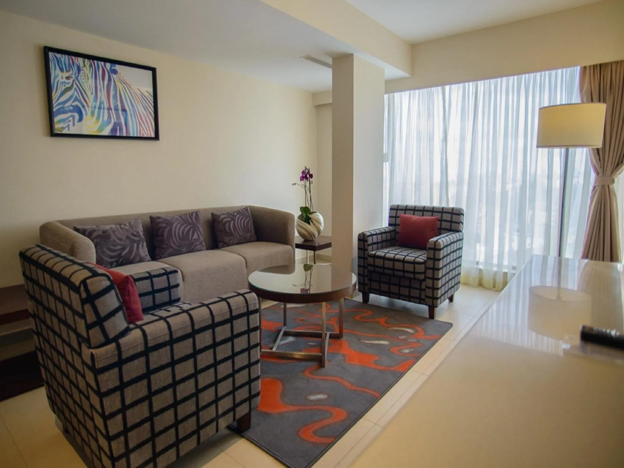 Living room in The Concord Hotel & Suites