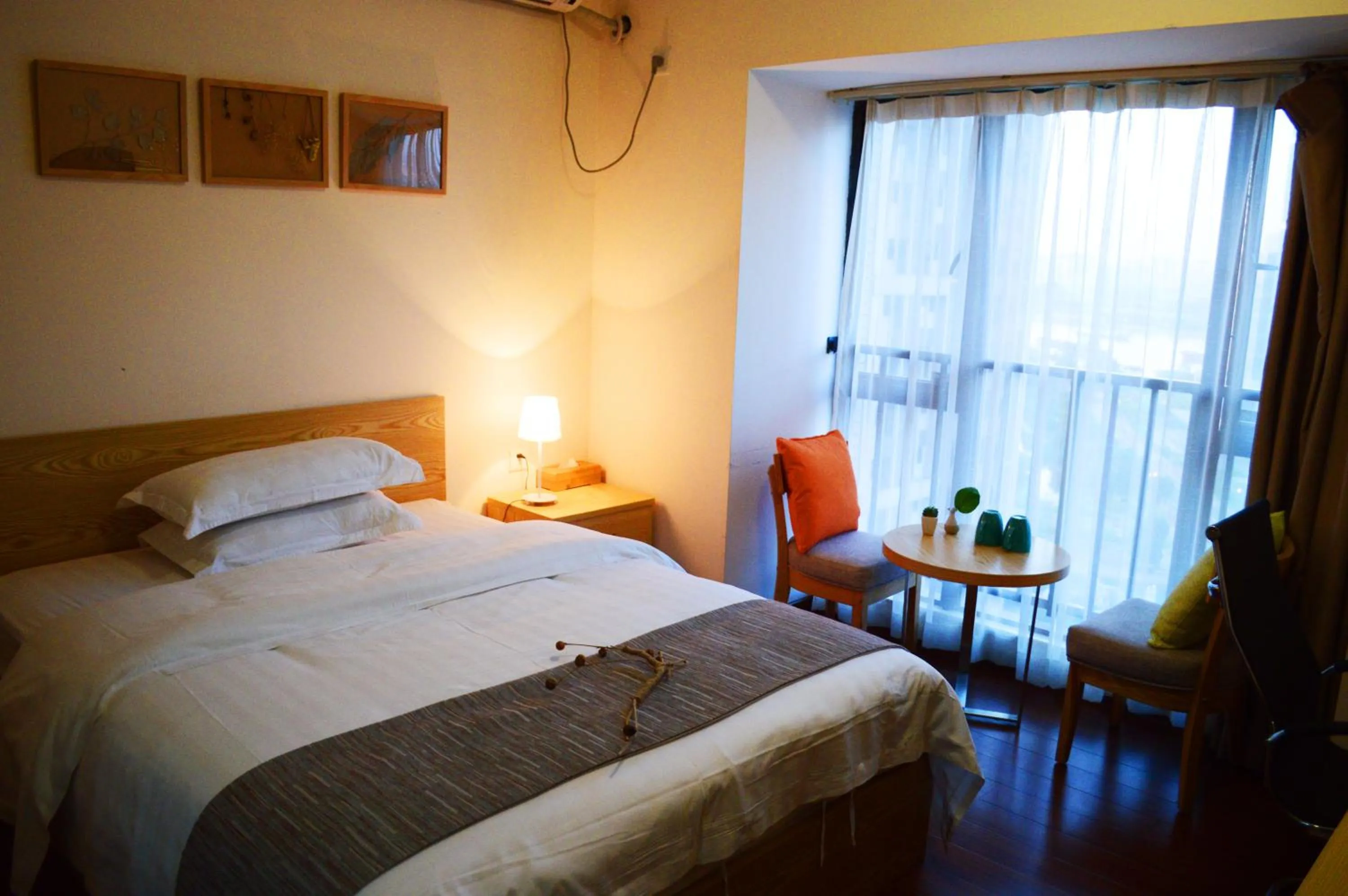 Decorative detail, Bed in Xizhengjia Apartment Hotel Pazhou Complex