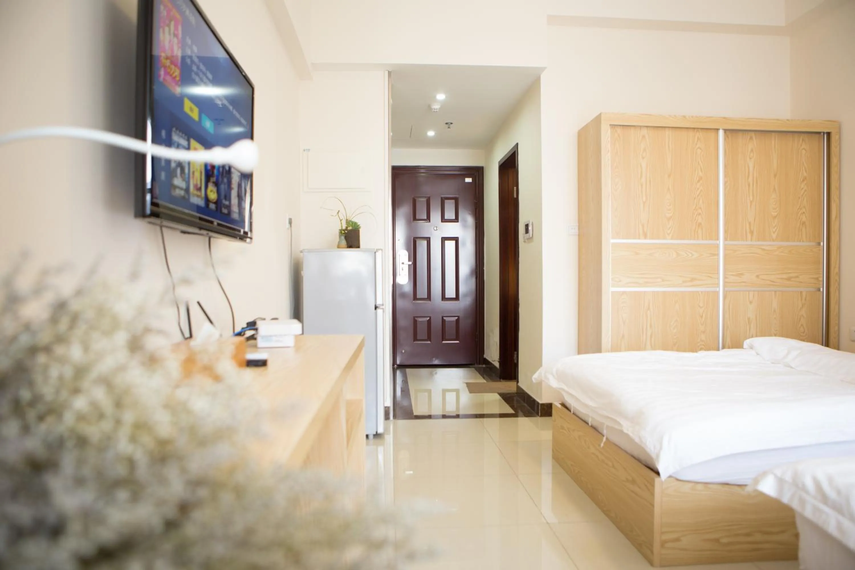 Photo of the whole room, Bed in Xizhengjia Apartment Hotel Pazhou Complex