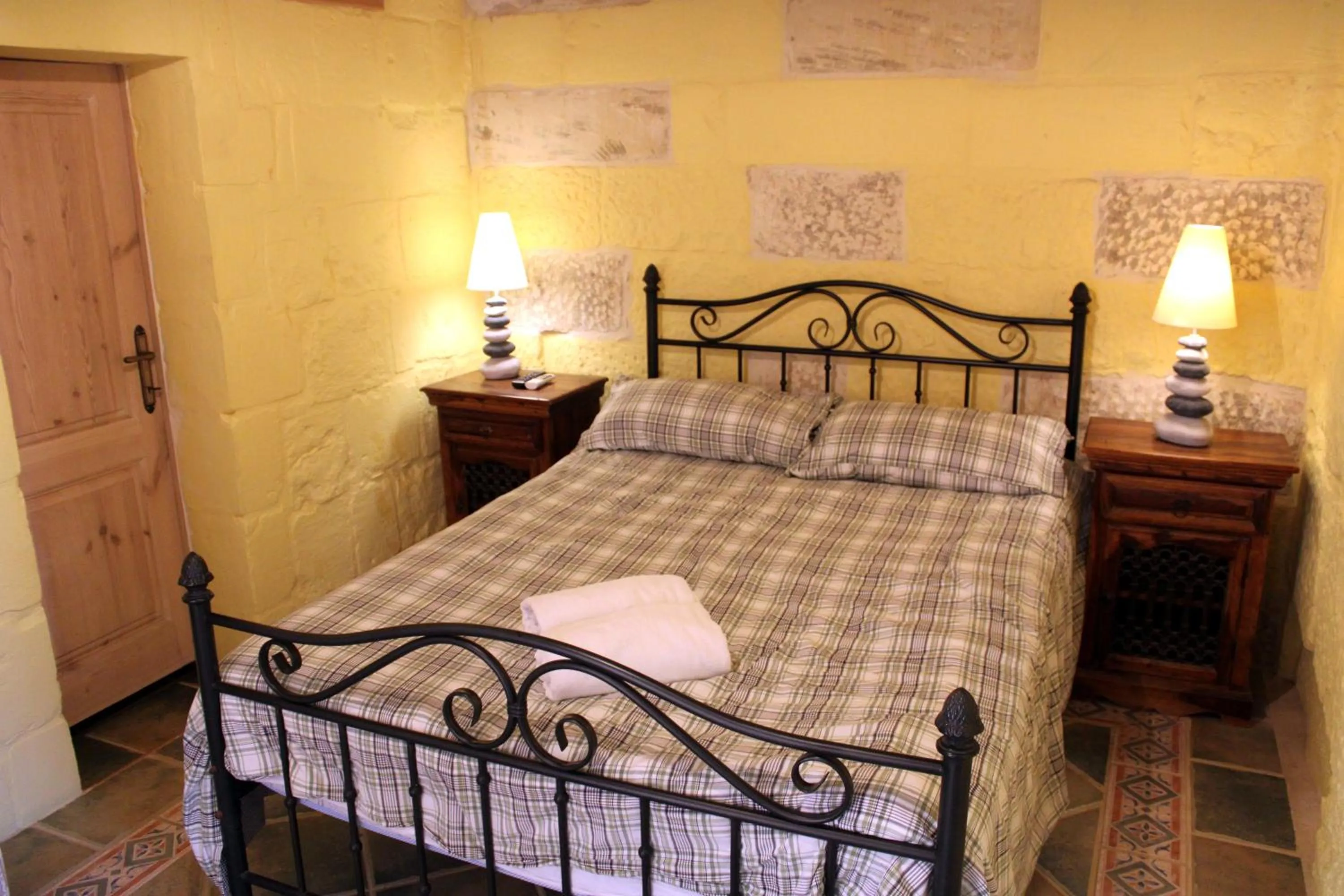 Bed in Il-Wileġ Bed & Breakfast