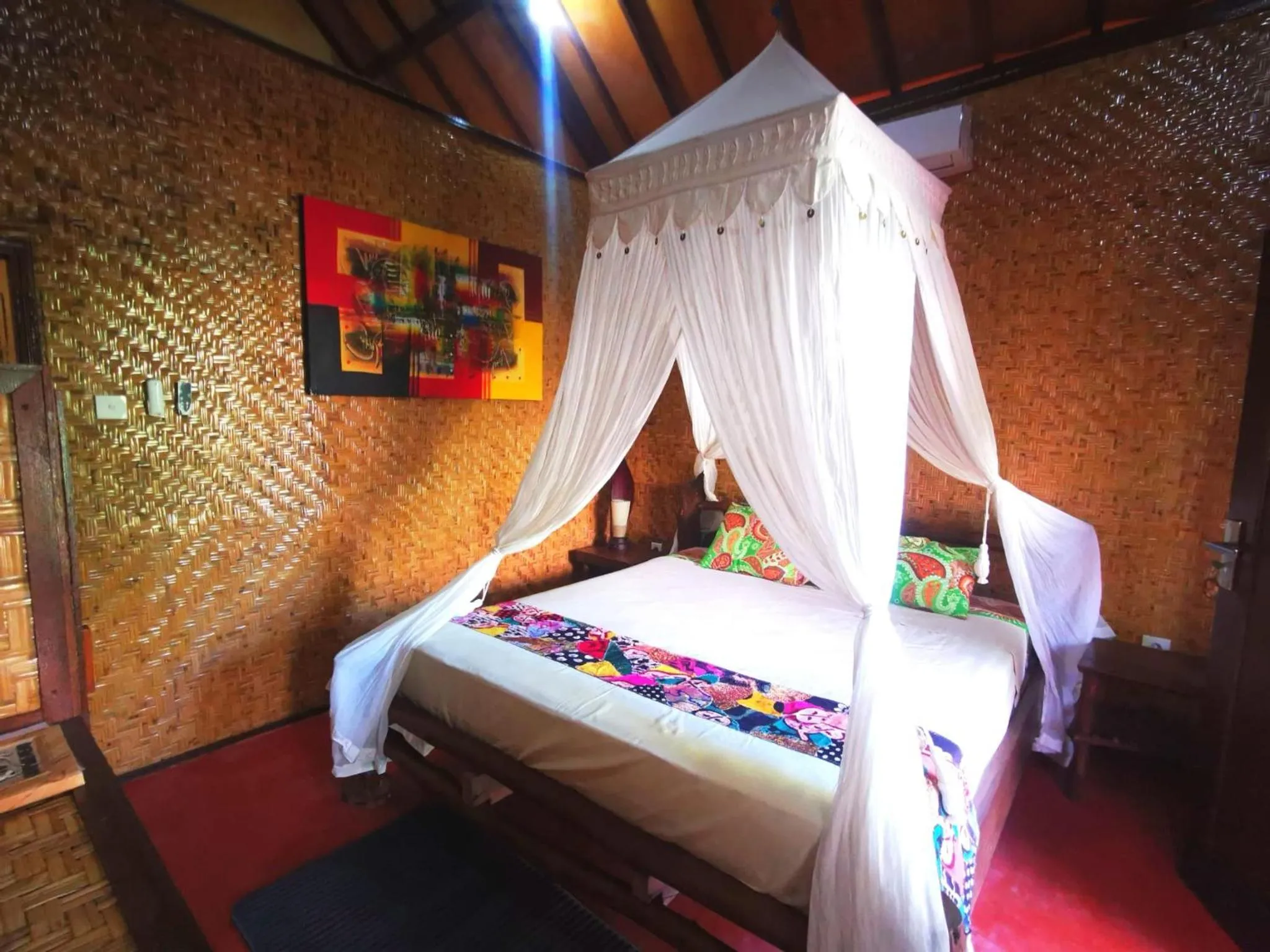 Bed in Kampung Meno Bungalows