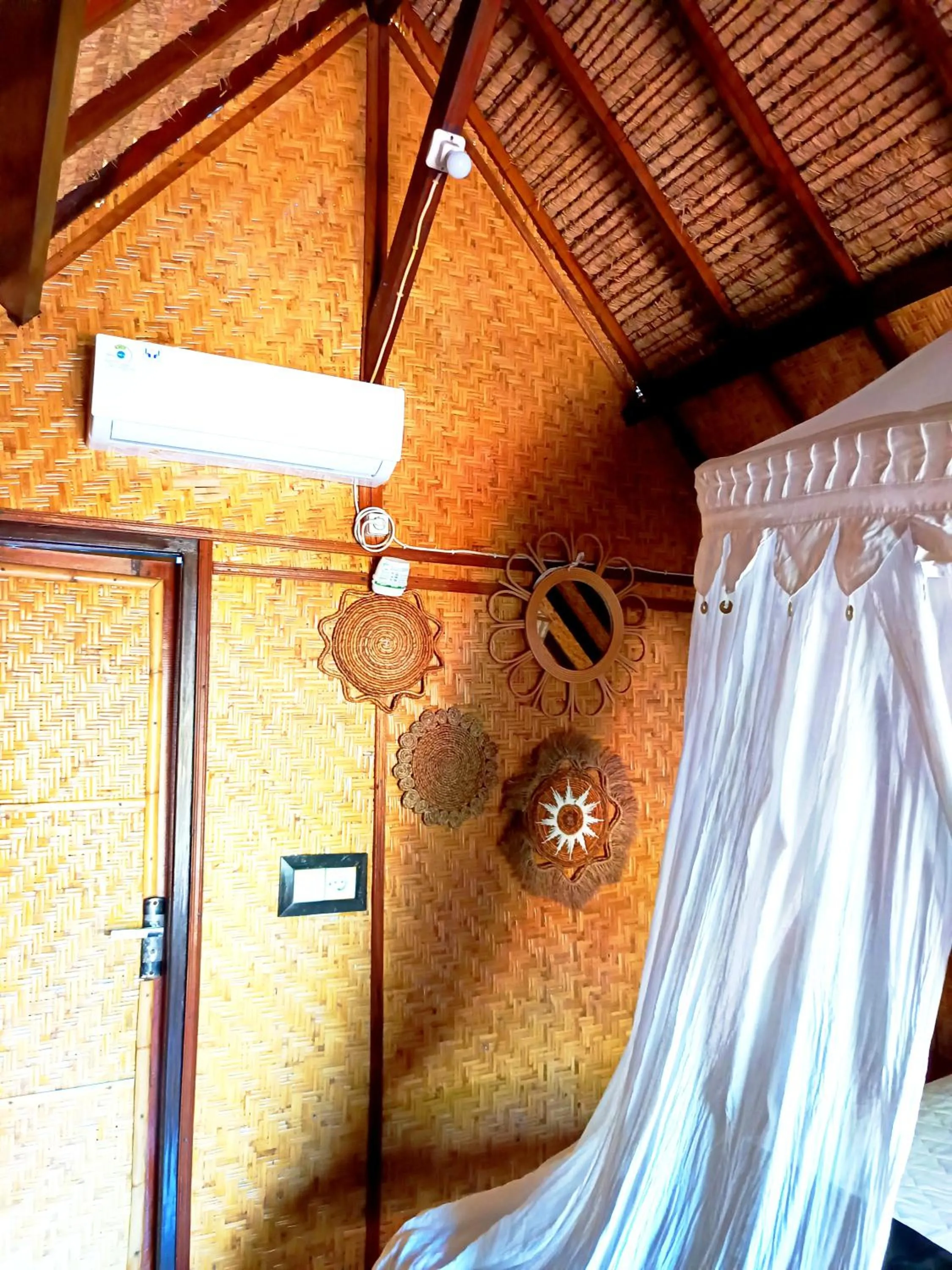Bedroom in Kampung Meno Bungalows