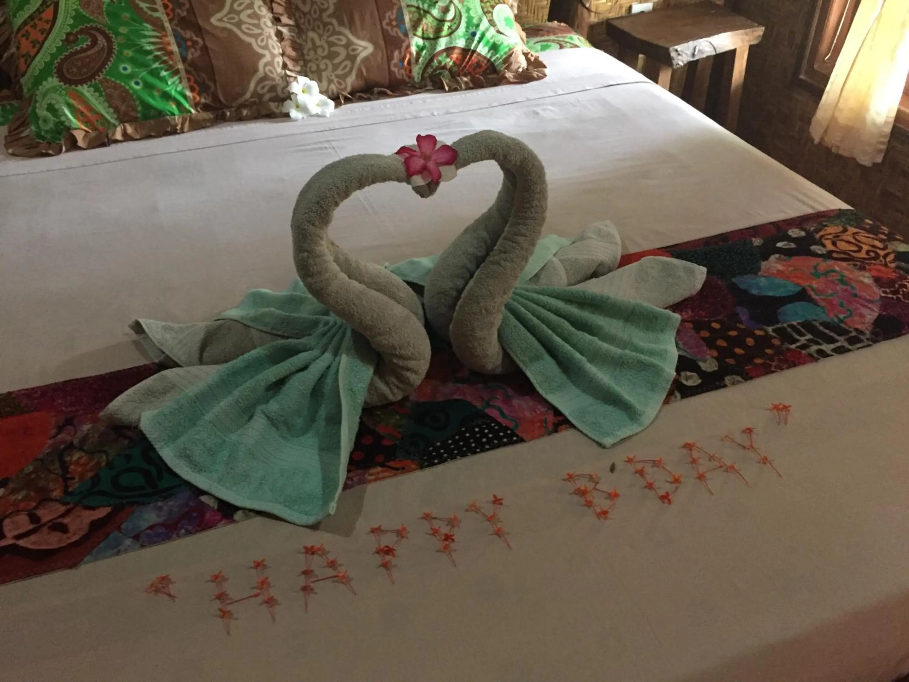 Decorative detail, Bed in Kampung Meno Bungalows