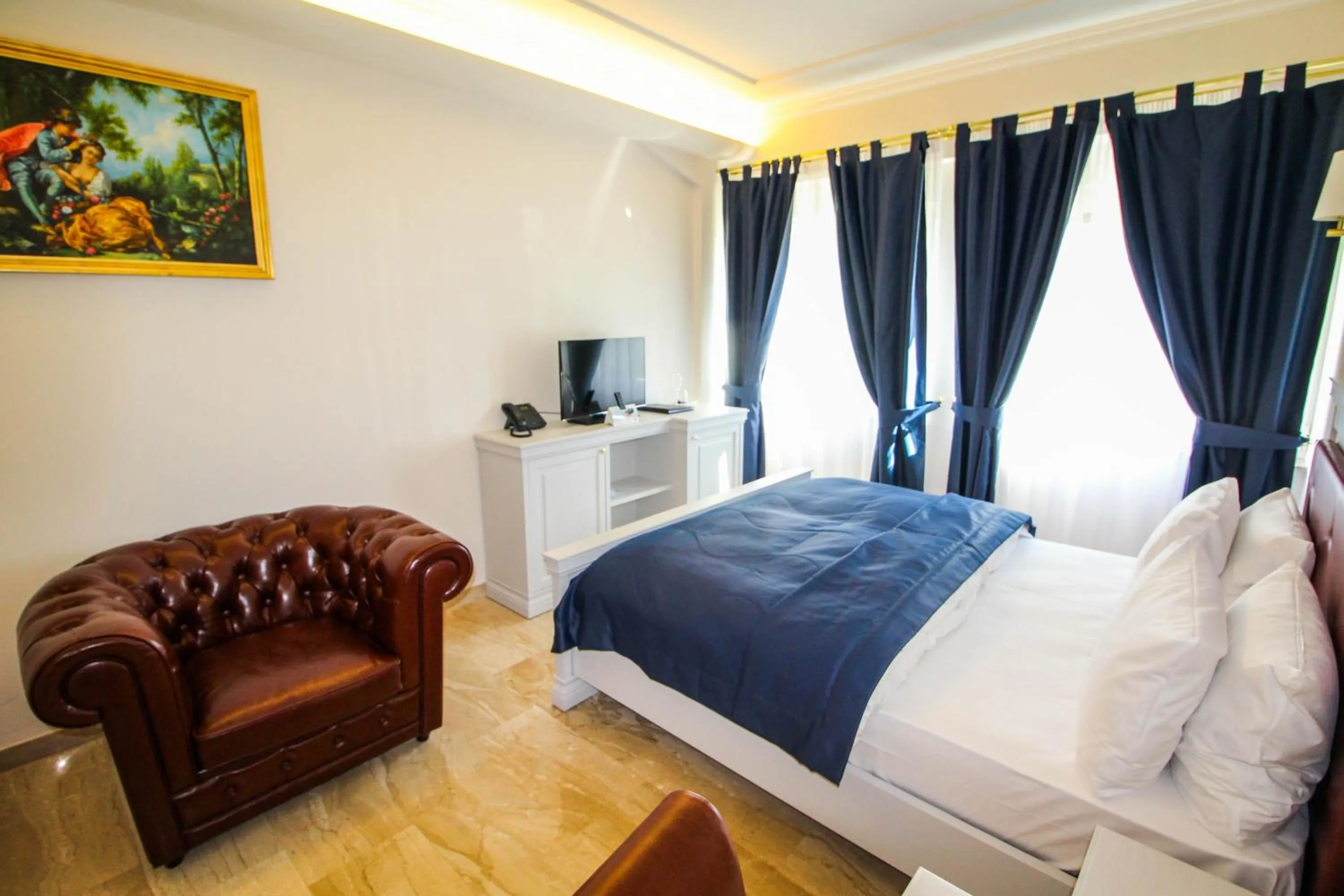 Bed in Grand Hotel Palladium