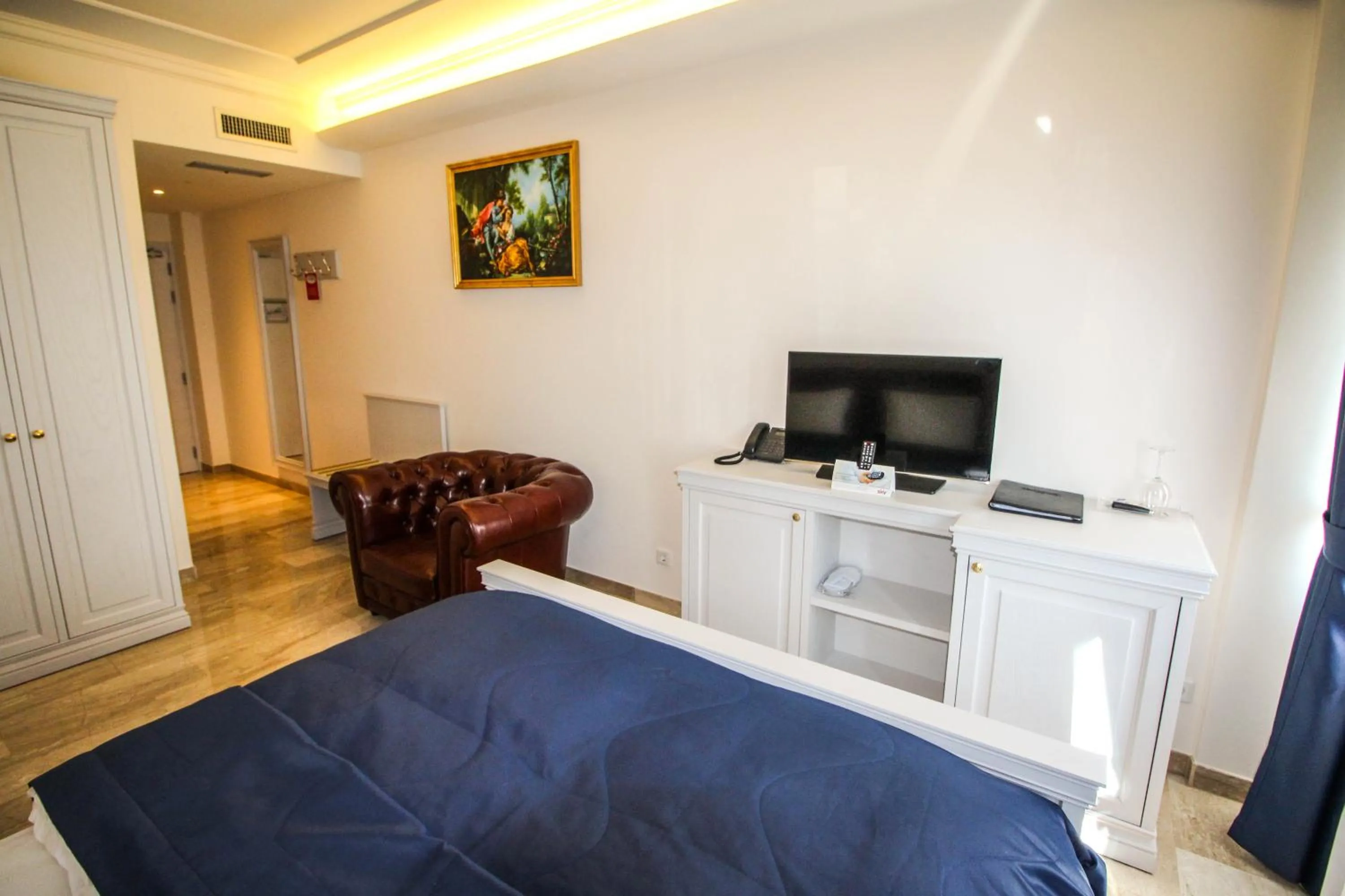 Bed in Grand Hotel Palladium