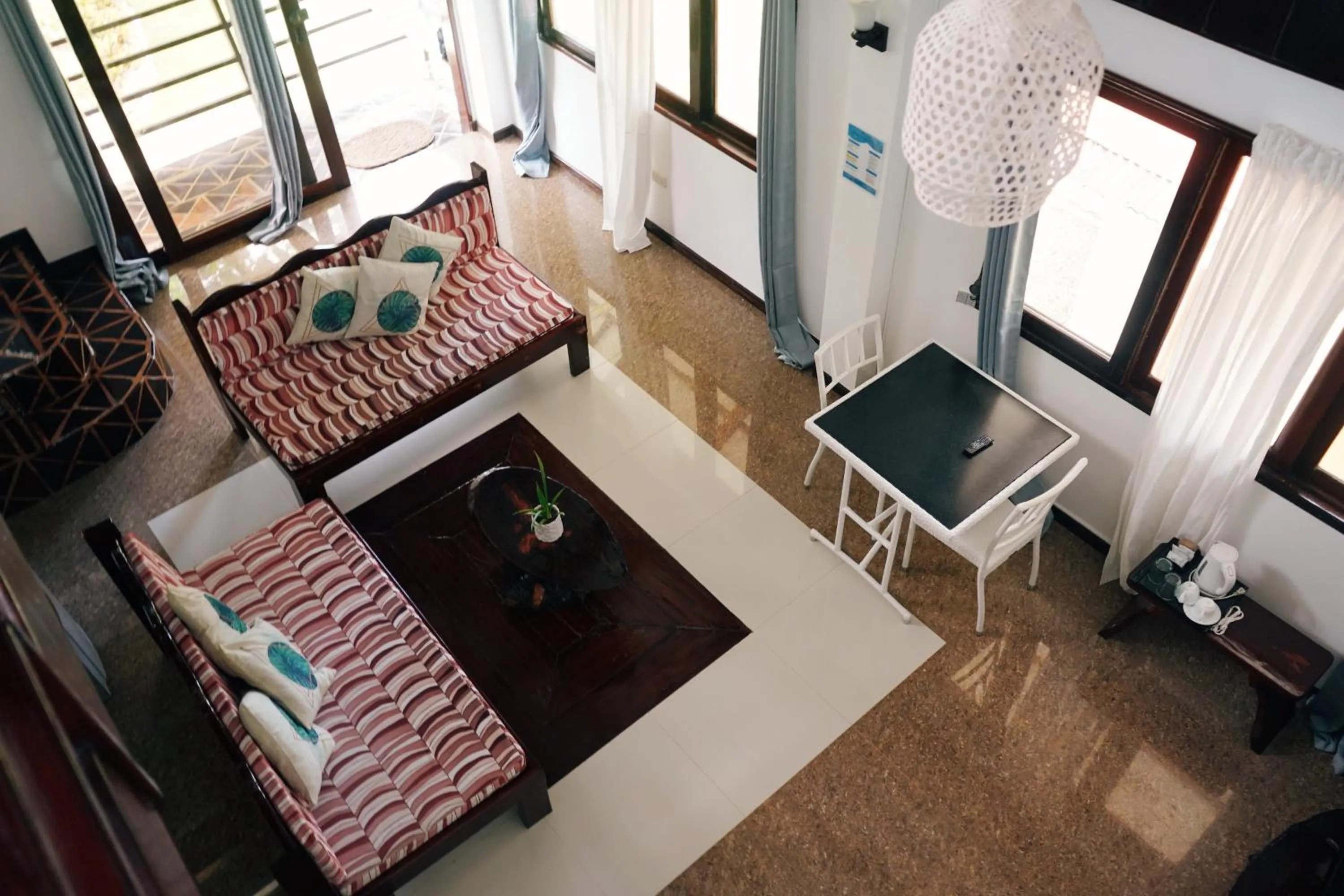 Living room, Bed in Ocean 101 Beach Resort