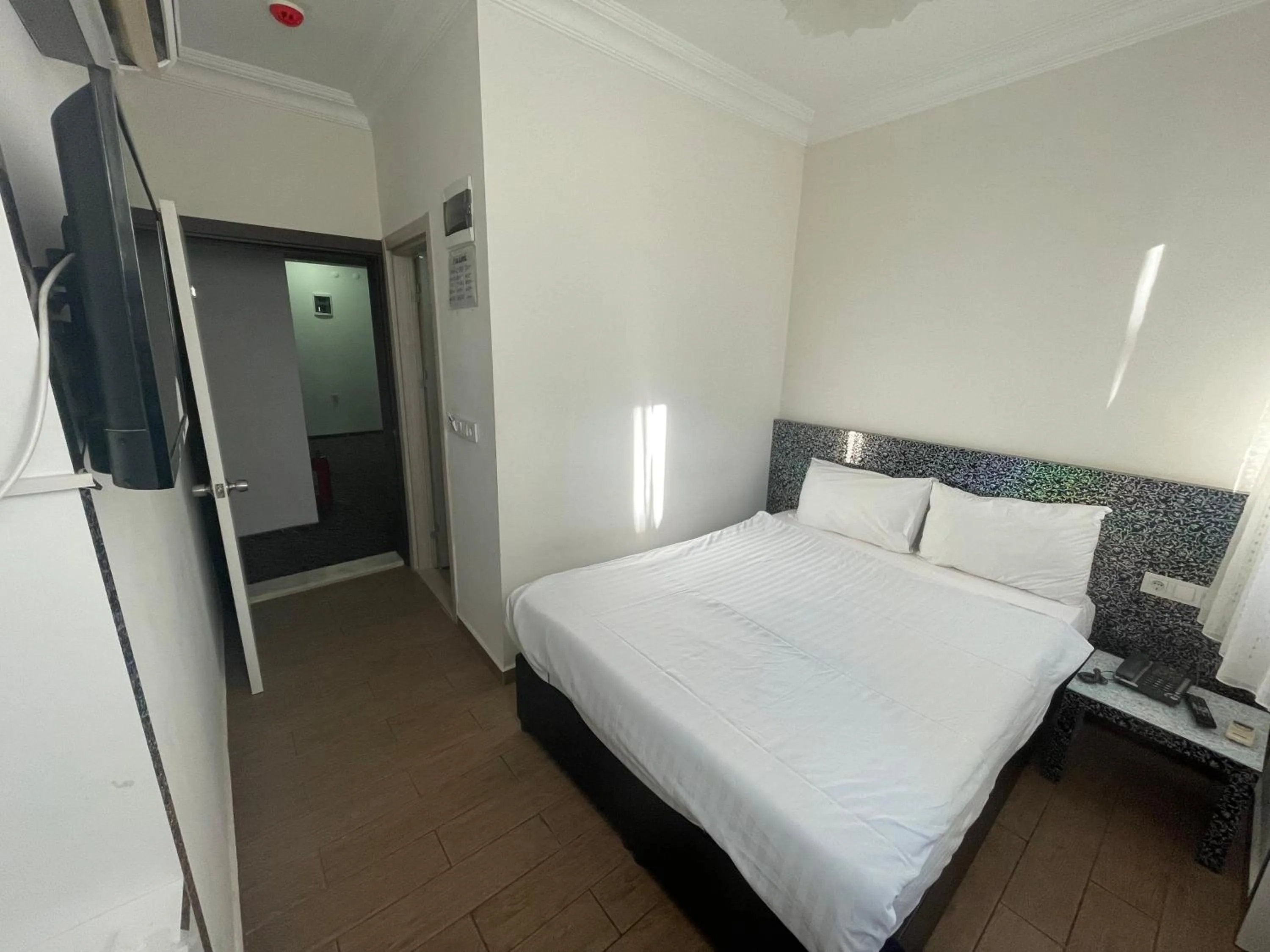 Photo of the whole room, Bed in Grand Lavin Hotel