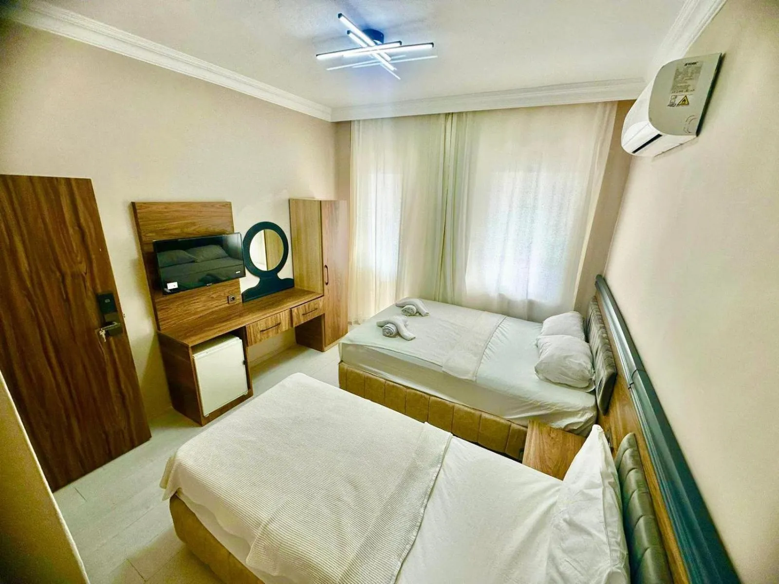 Photo of the whole room, Bed in Grand Lavin Hotel